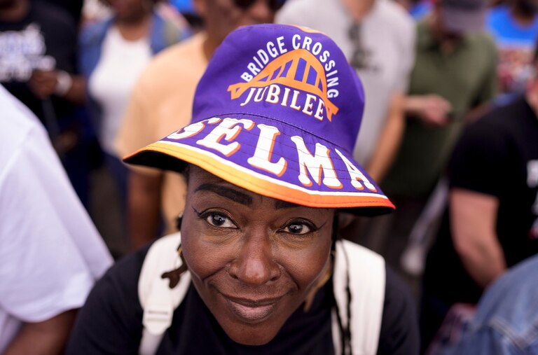 Debbie Murray, of Edison, Ga., waits to march ahead of the 61st Bloody Sunday Anniversary march, Sunday, March 8, 2026, in Selma, Ala. (AP Photo/Mike Stewart)