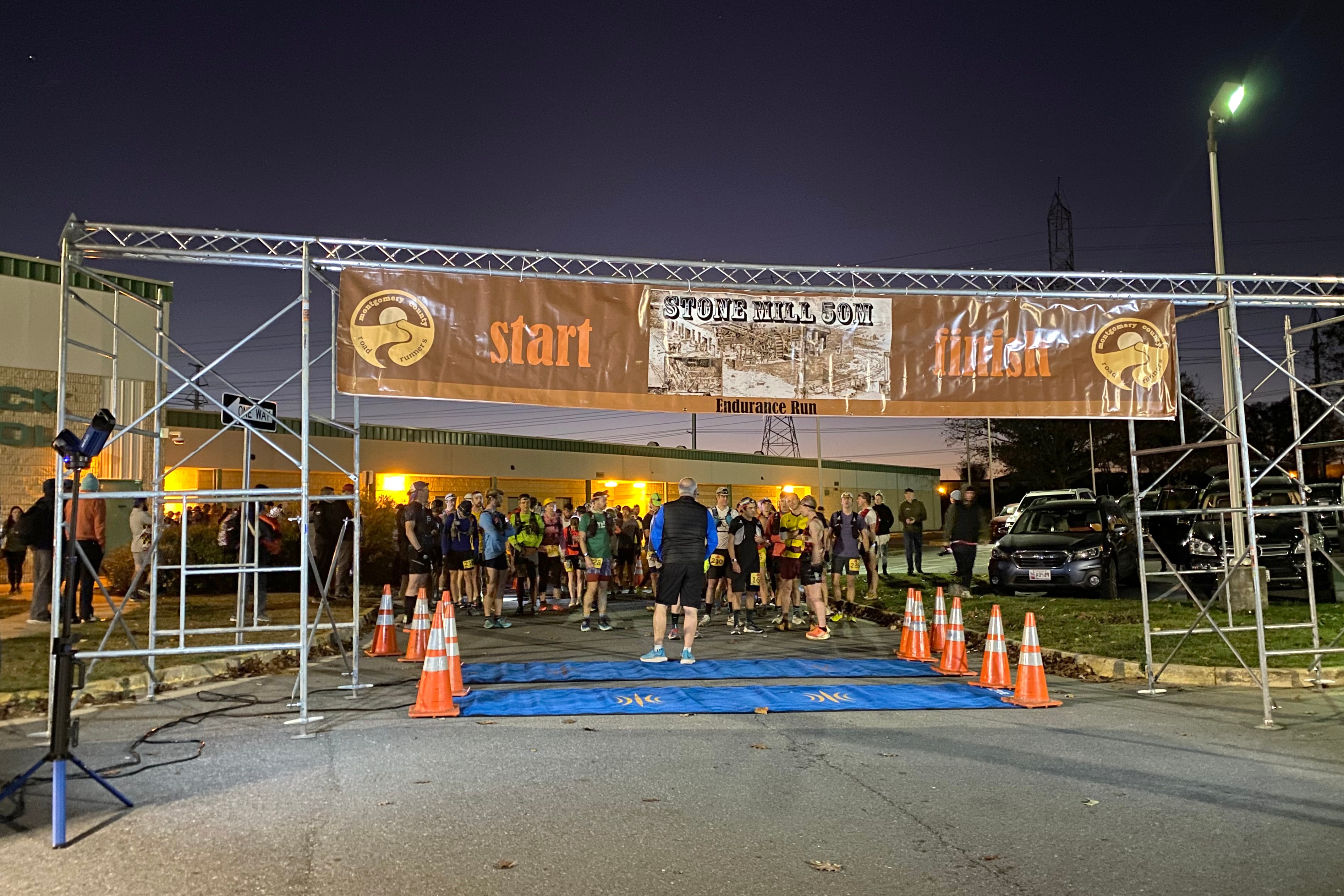 Runners line up for the start of the 2024 Stone Mill 50 Mile Run.