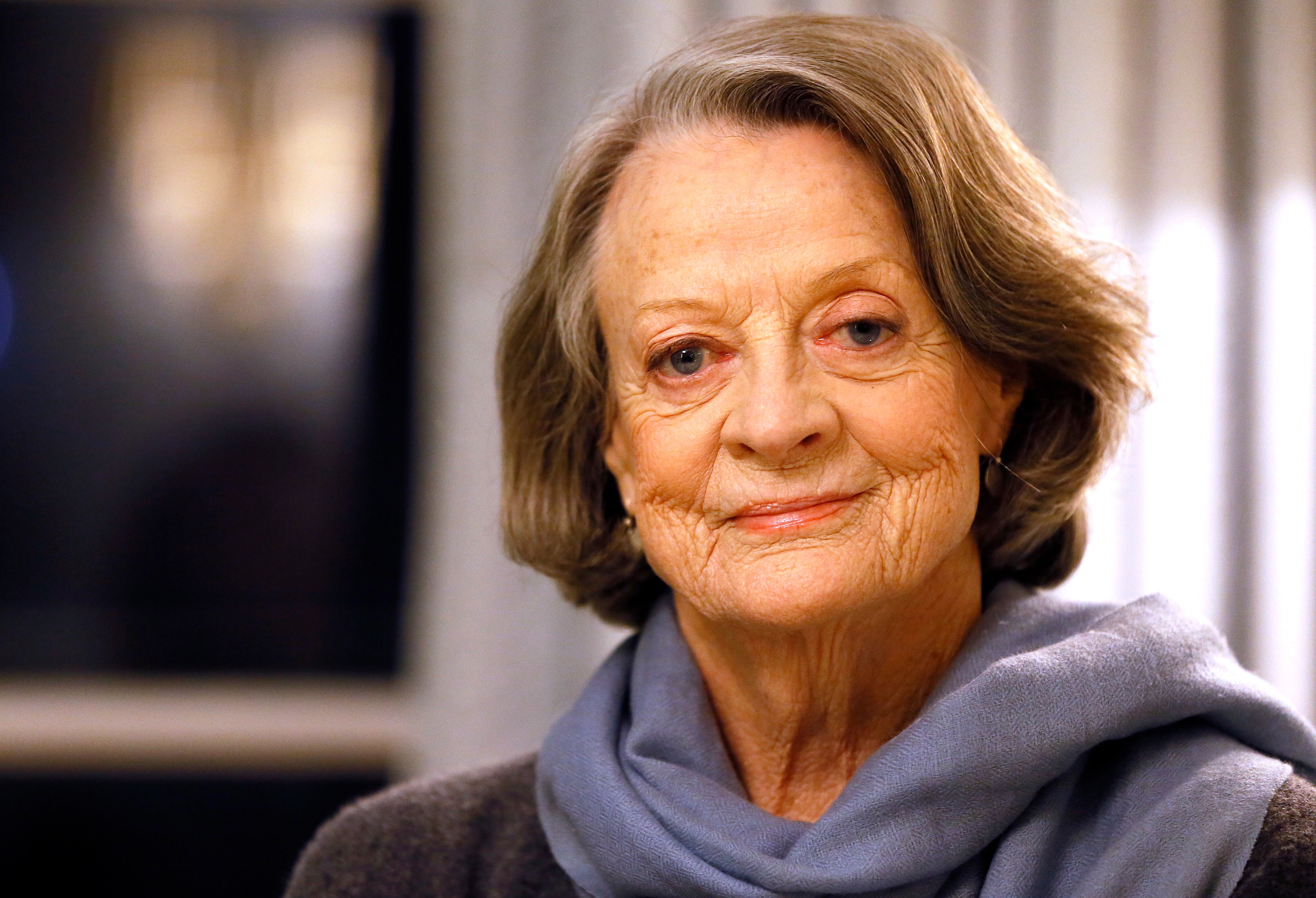 British actress Dame Maggie Smith poses in London