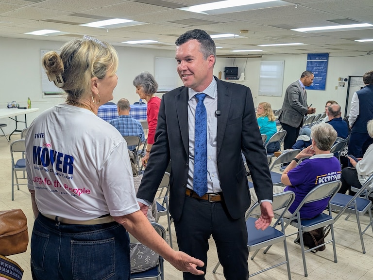 James Kitchin, a Democratic candidate for Anne Arundel County executive, talks to Loni Moyer, a Democrat running for Orphans Court Judge, before a May 6, 2026 forum in Mayo.