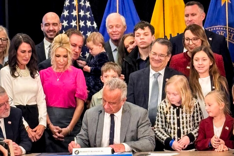 At the Federal Health and Human Services press conference in Washington, DC, United States Secretary of Health and Human Services Robert F. Kennedy Jr. signs the mandate surrounded by children with MLD/ DMD and their families and advocates.