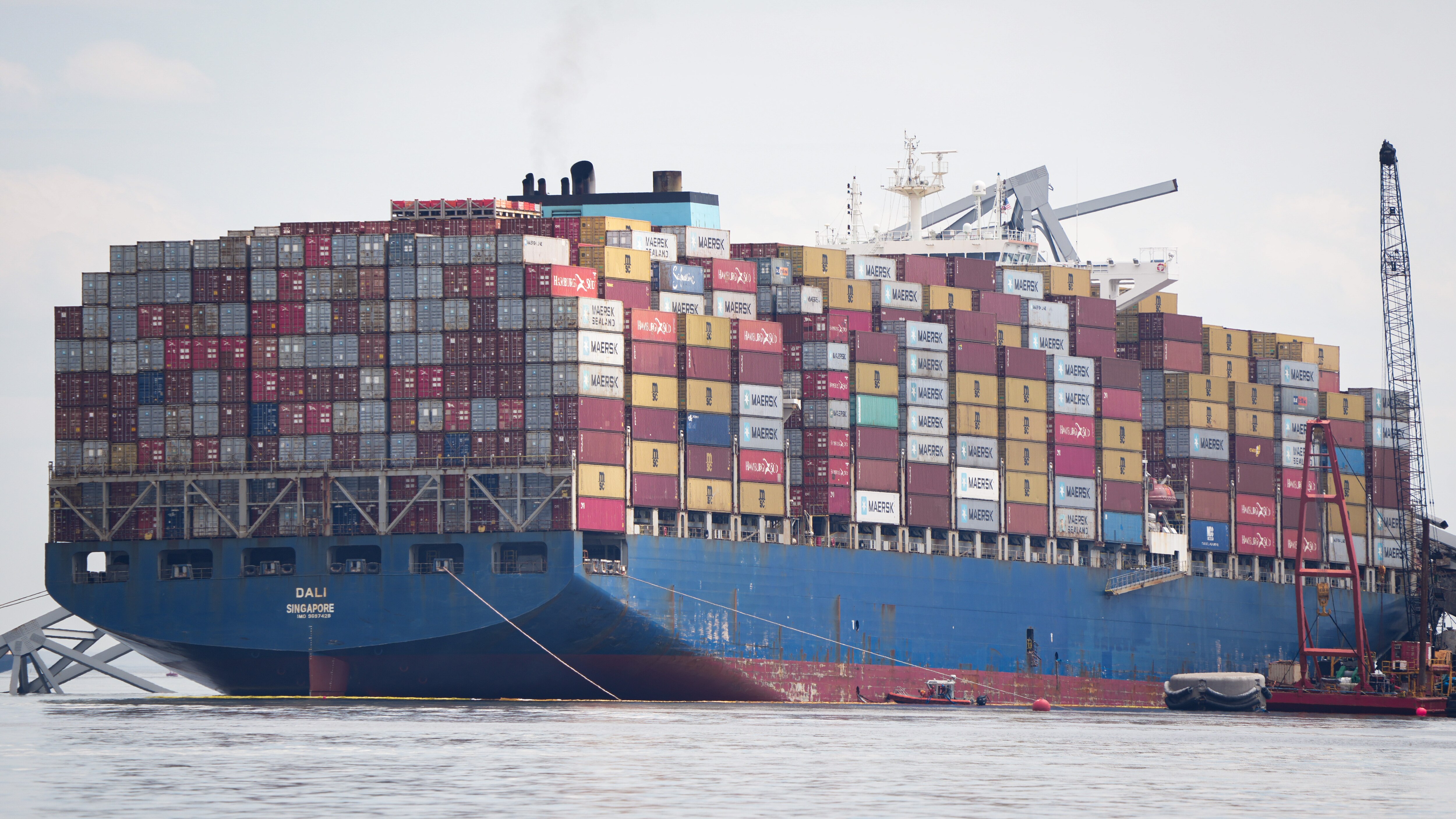 The Dali cargo ship and the collapsed Francis Scott Key Bridge are seen from a Department of Natural Resources boat on the Patapsco River in Baltimore on April 10.