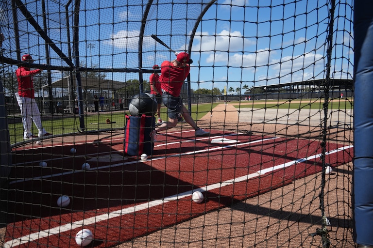 Washington Nationals outfielder Jacob Young takes swings in the batting cage during spring training on Feb. 12.