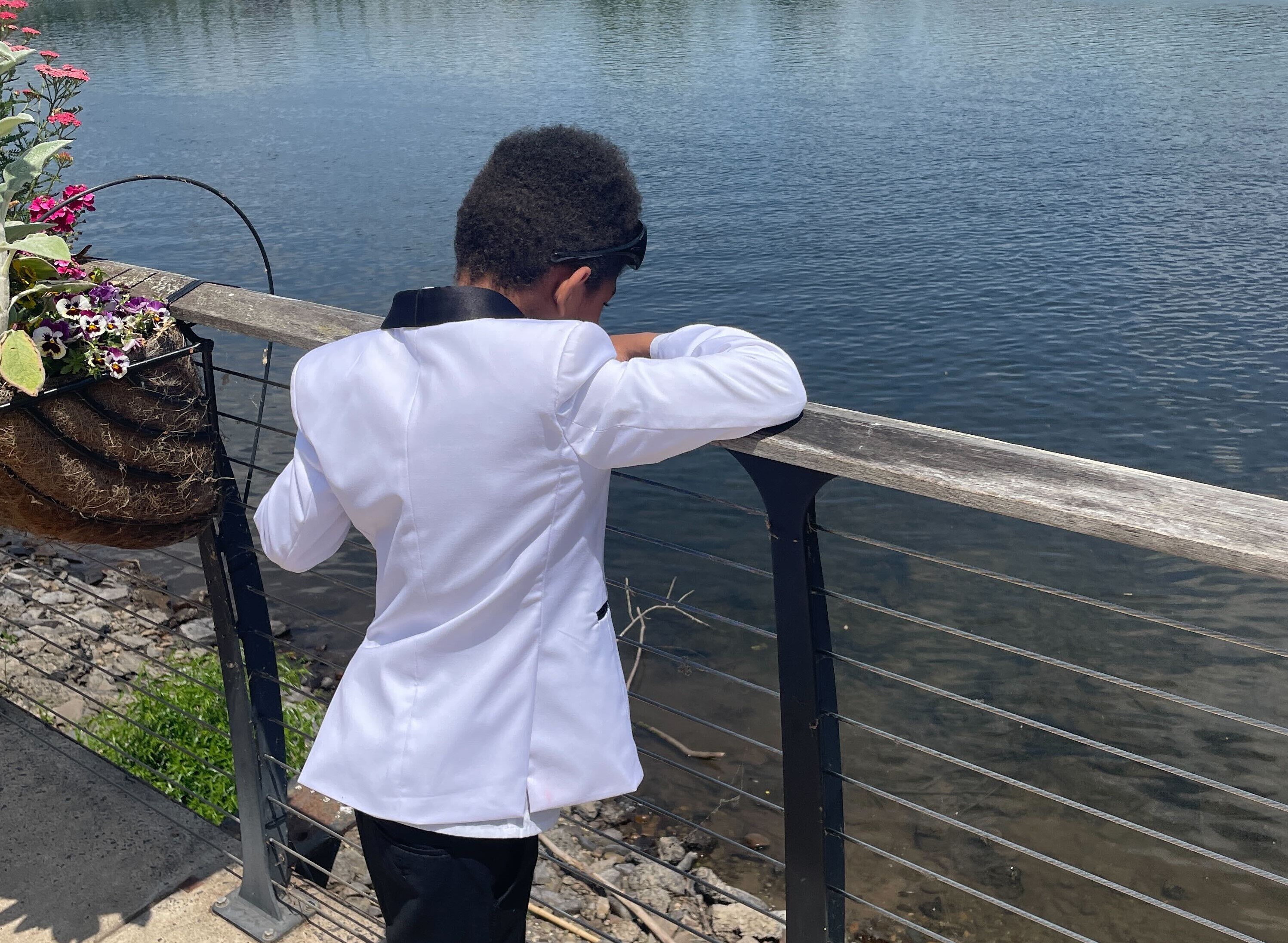 This well-dressed young man is developing his own sense of style — and of everything else.