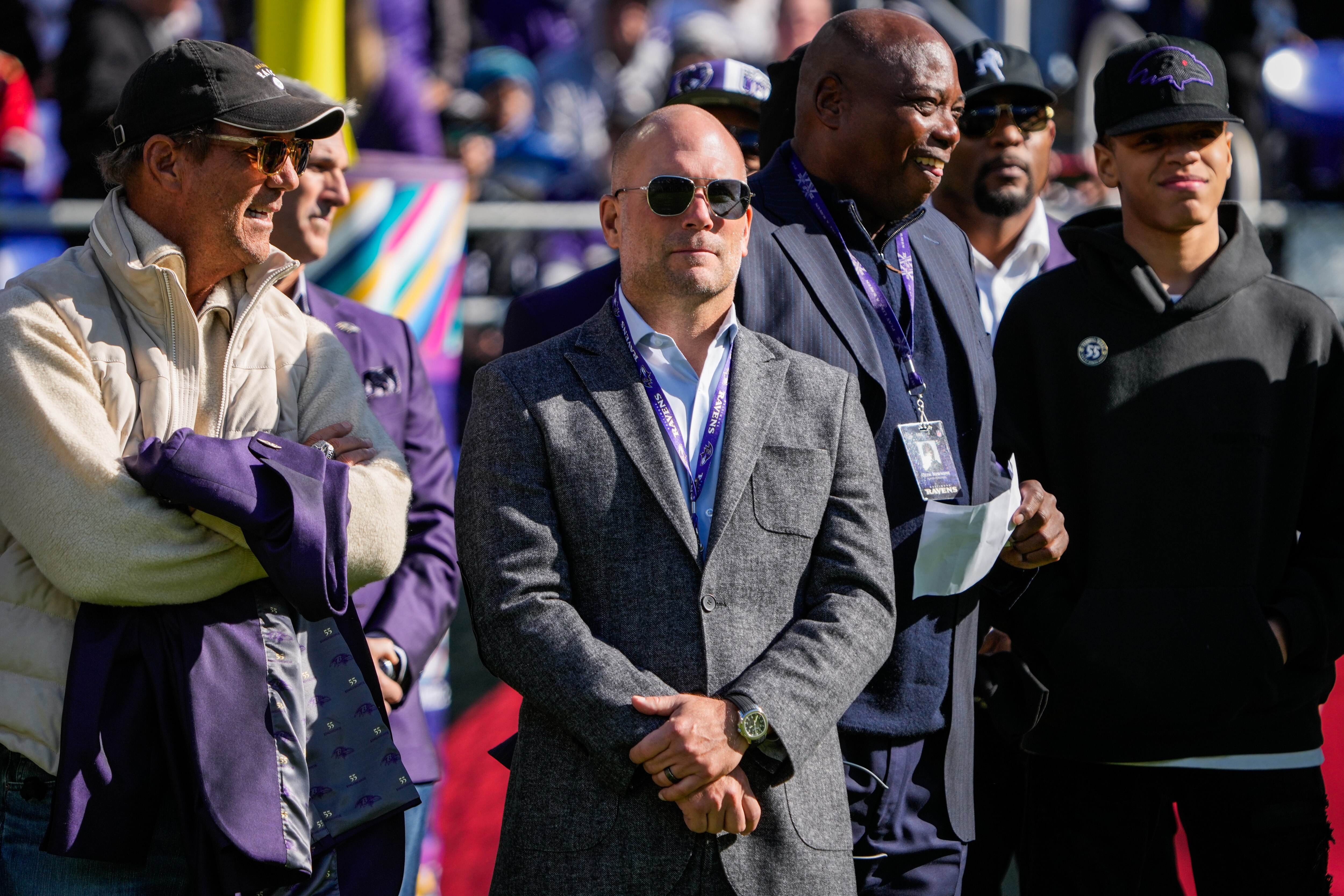 Ravens general manager Eric DeCosta (center) was in the spotlight during the offseason, and the moves he made helped get the team where it is now.