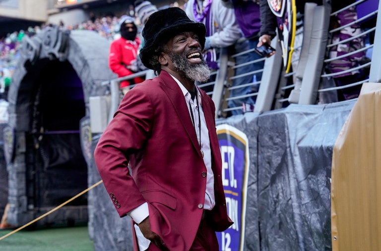 Baltimore Ravens legend Ed Reed greets fans in the crowd before a game against the Philadelphia Eagles at M&T Bank Stadium in Baltimore, Md. on Sunday, December 1, 2024.