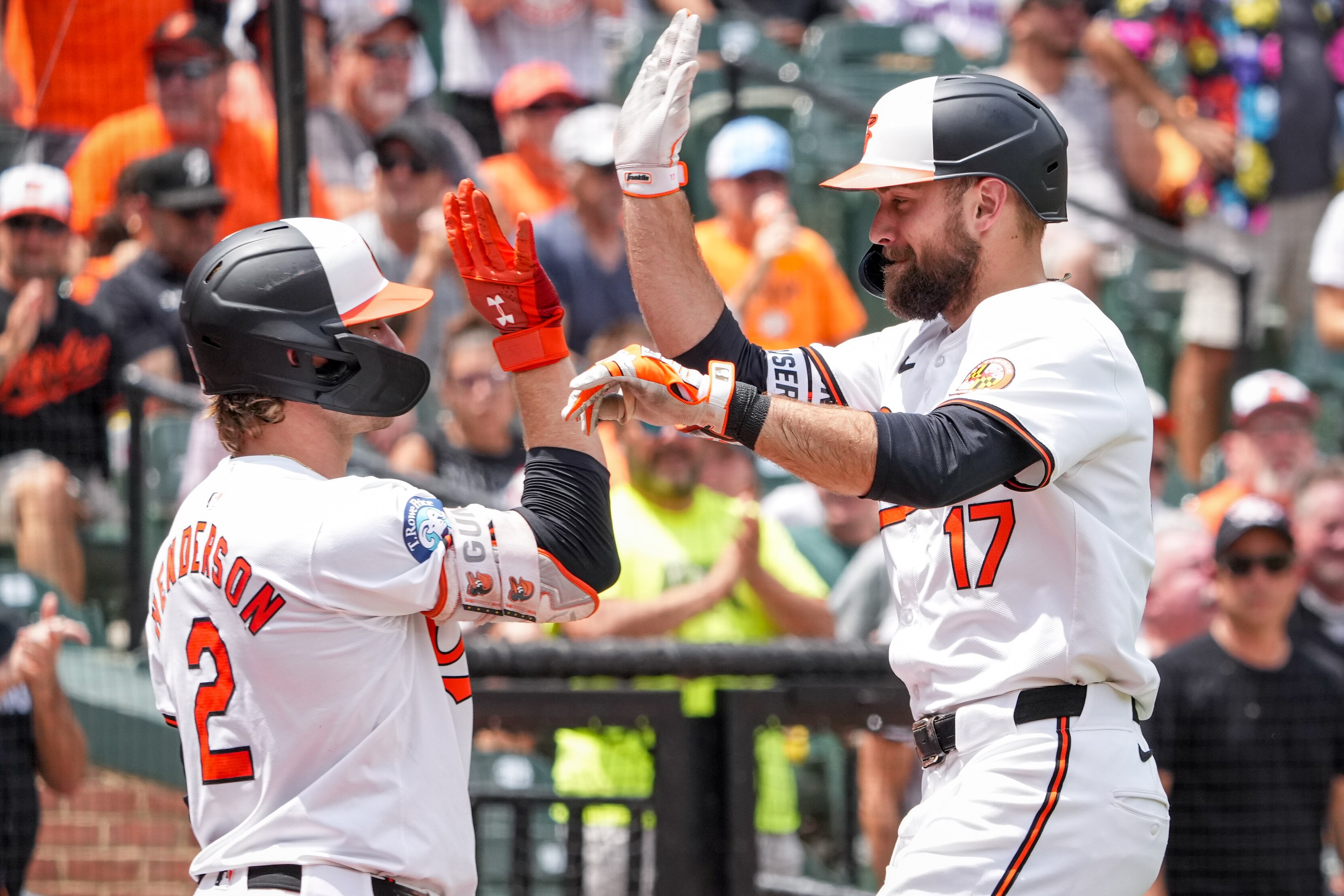 Outfielder Colton Cowser (17) celebrates with Gunnar Henderson (2) after homering during a game against the Toronto Blue Jays in 2024.
