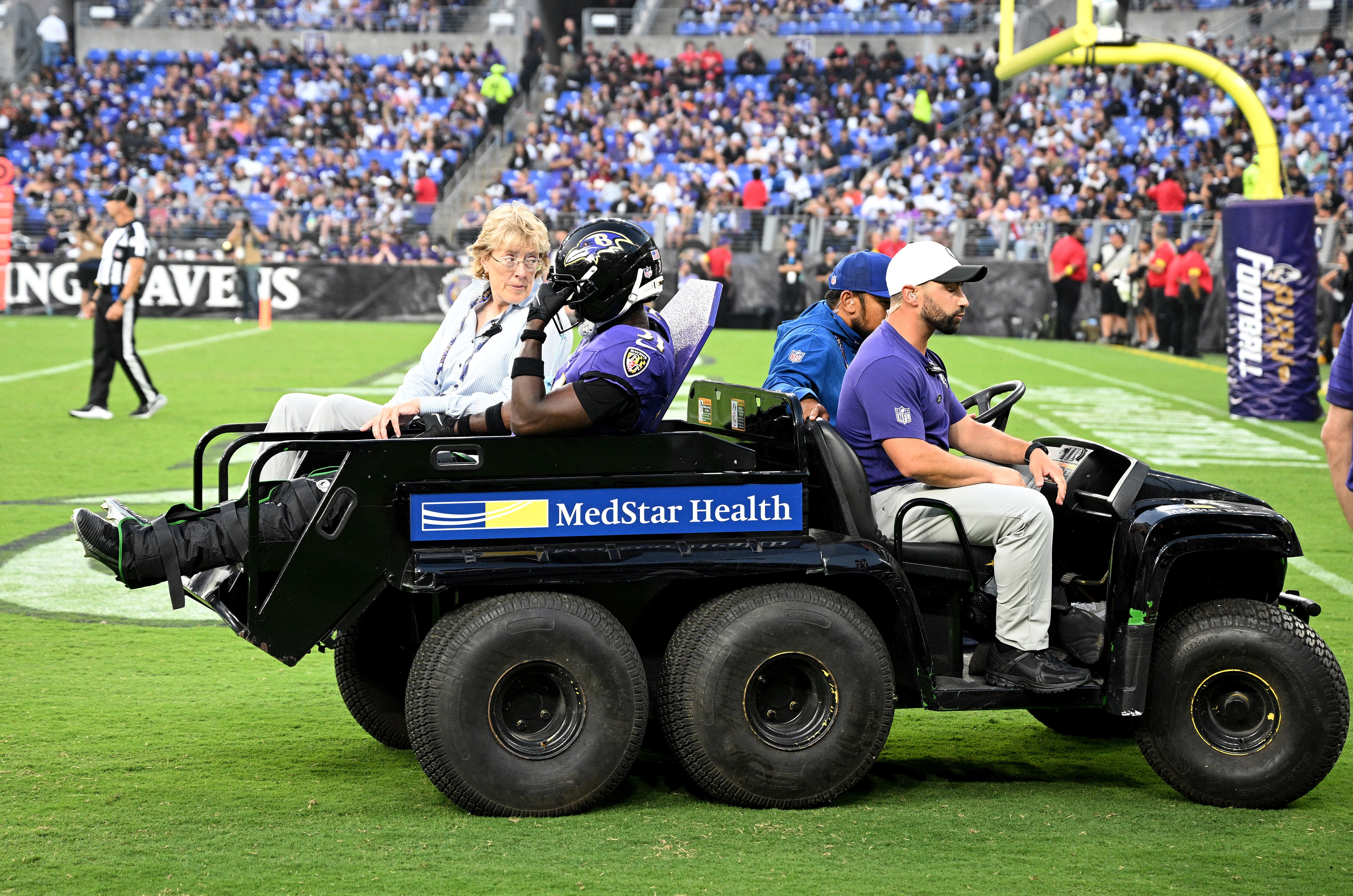 BALTIMORE, MARYLAND - AUGUST 07: Bilhal Kone #31 of the Baltimore Ravens is carted off the field after an injury in the first quarter against the Indianapolis Colts during the NFL Preseason 2025 game at M&T Bank Stadium on August 07, 2025 in Baltimore, Maryland.