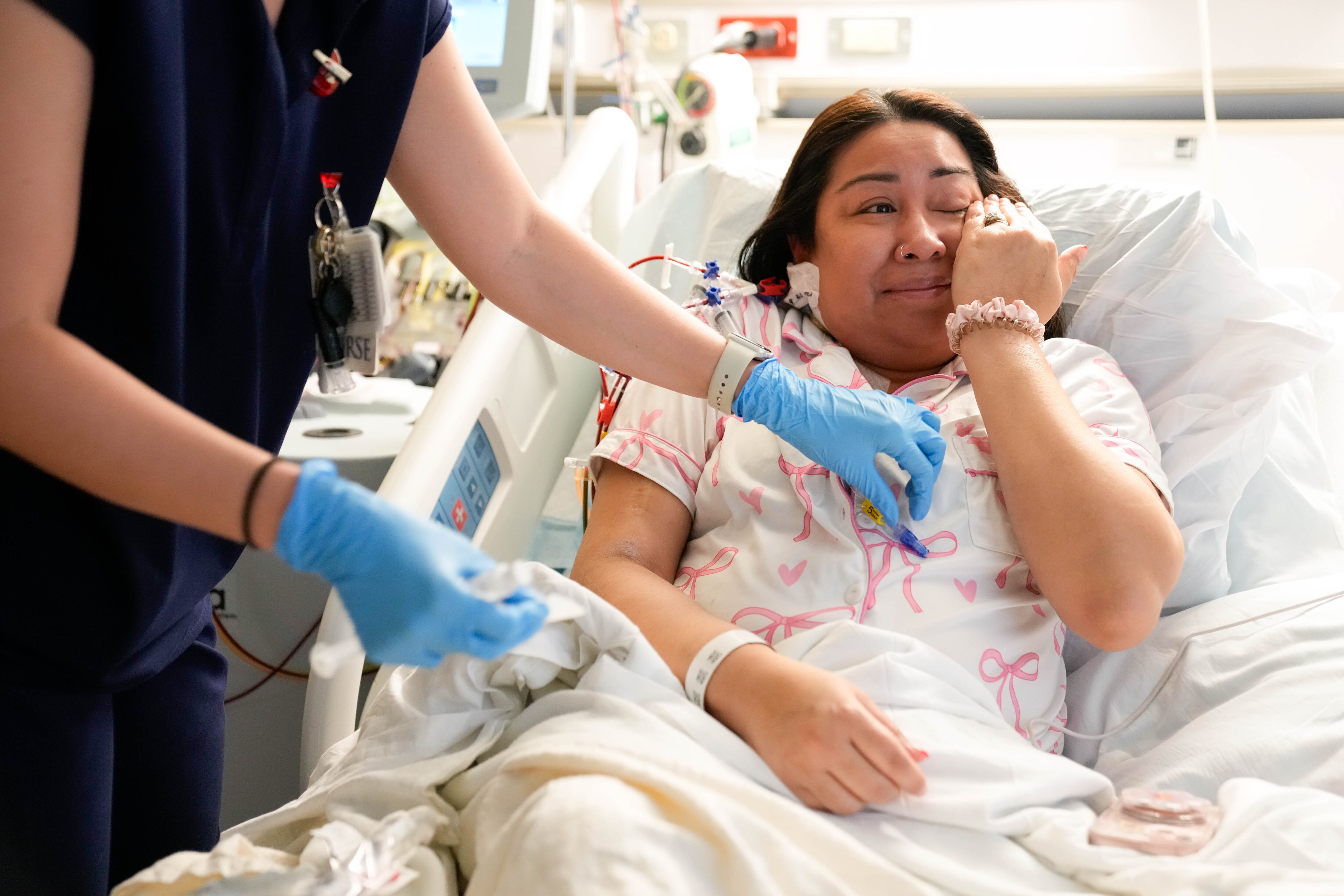 Jessica Ceja wipes away tears as she undergoes treatment for sickle cell disease at the University of Maryland Medical Center in December.