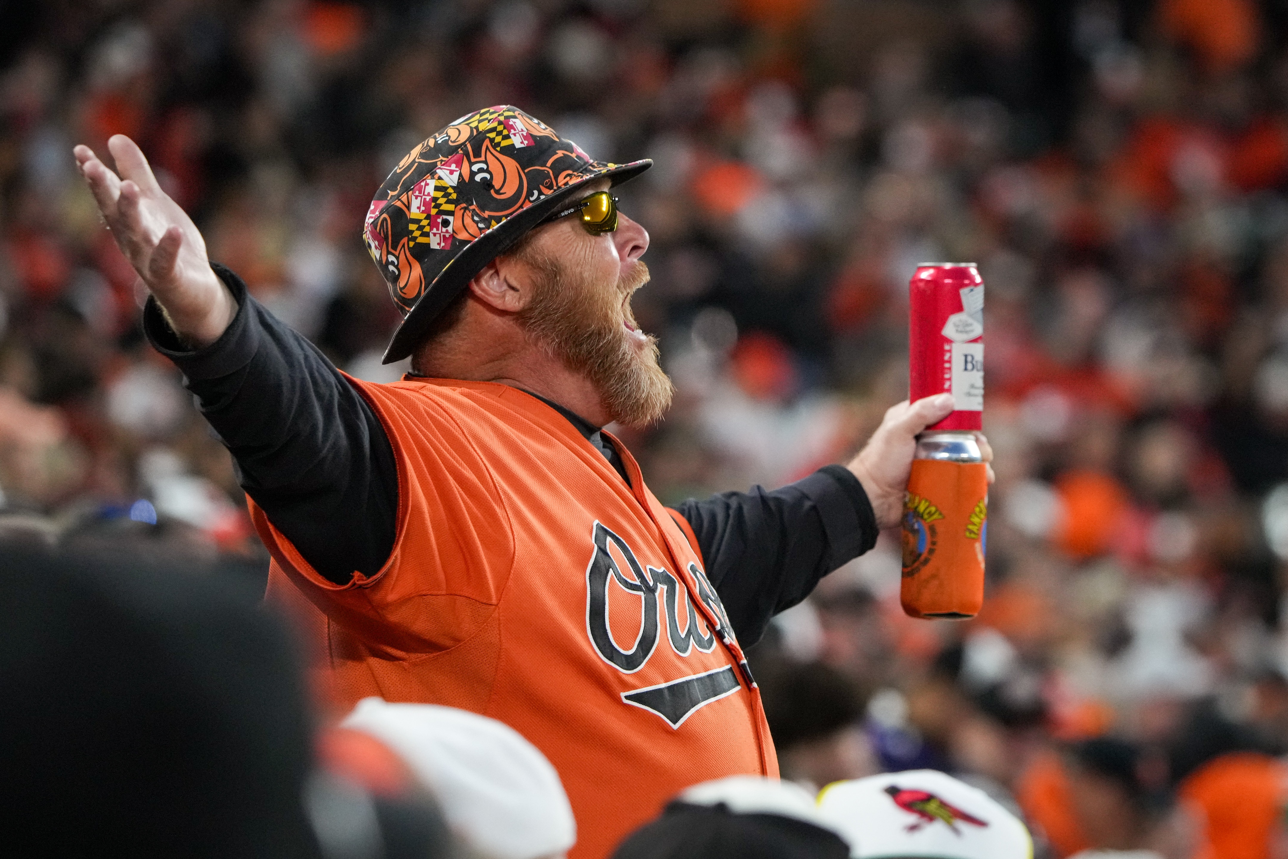“Fired Up Guy” Merrill Heim pumps up the crowd during Game 2 of the American League Division Series between the Orioles and Texas Rangers on Sunday.