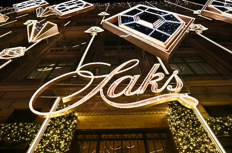 FILE - Holiday decorations are displayed during Saks Fifth Avenue's holiday light show and window reveal, Nov. 24, 2025, in New York. (Photo by Evan Agostini/Invision/AP, File)