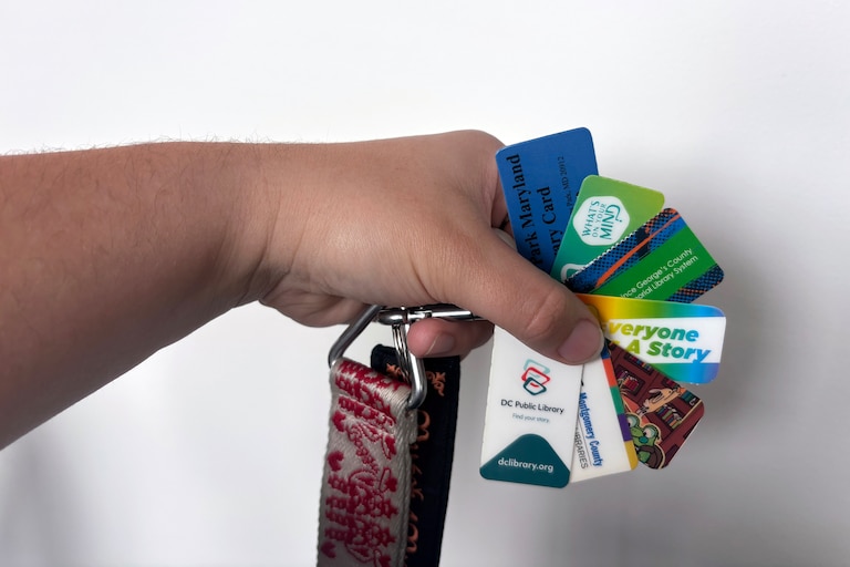 Reporter Ginny Bixby’s collection of library card key tags.
