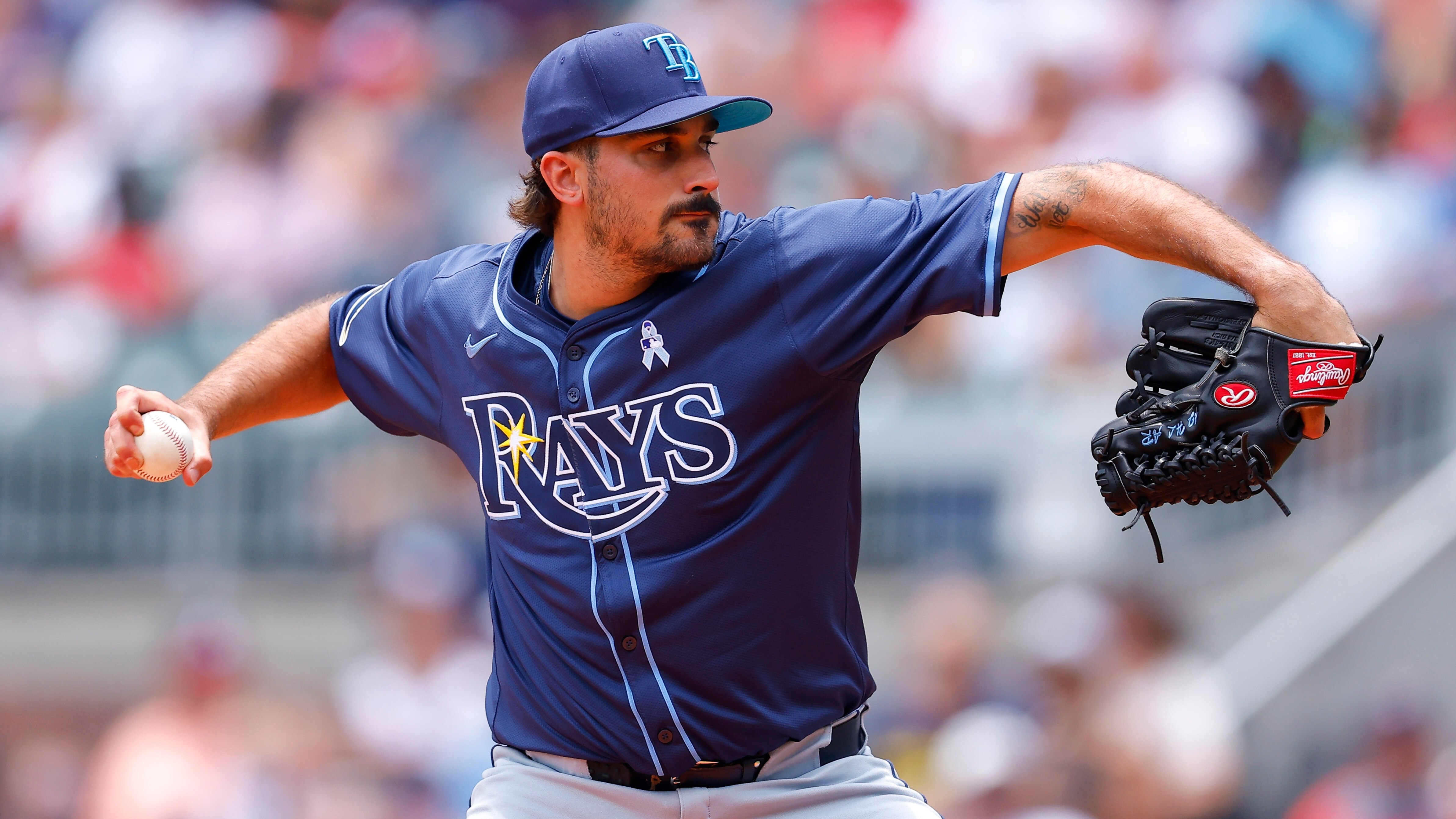 ATLANTA, GEORGIA - JUNE 16: Zach Eflin #24 of the Tampa Bay Rays pitches during the first inning against the Atlanta Braves at Truist Park on June 16, 2024 in Atlanta, Georgia. (Photo by Todd Kirkland/Getty Images)