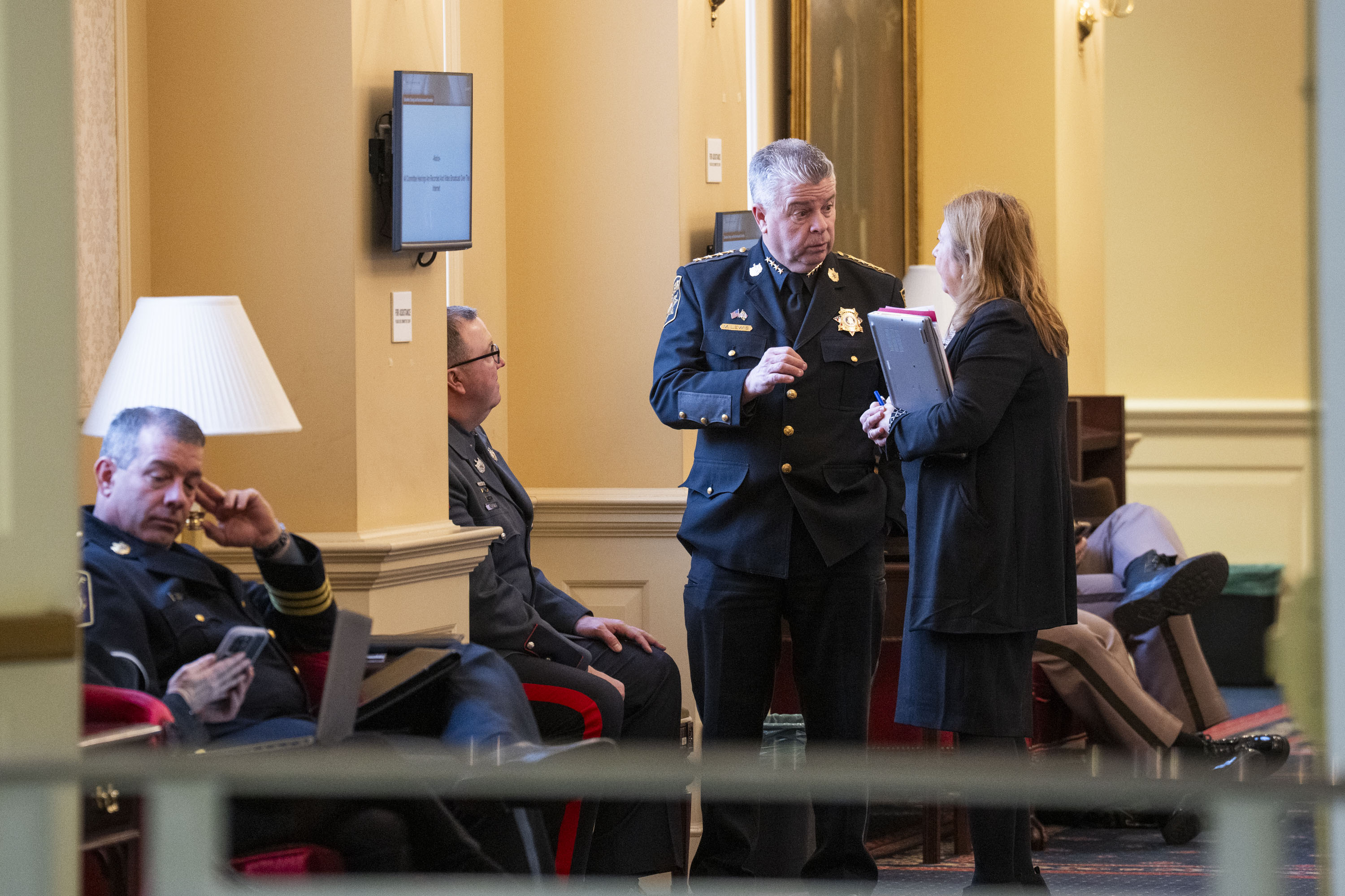 Wicomico County Sheriff Mike Lewis, right, chats with Sen. Mary Beth Carozza in the hallway outside the chambers for the Judicial Proceedings Committee ahead of hearings on two ICE-related bills, SB0001 and SB245 in January.