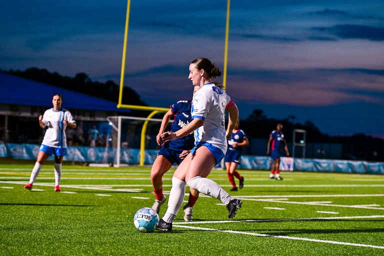 Annapolis Blues Women's Team Captain Sarah Martin duels against a Virginia Beach FC player during the first game of the 2026 season on May 16, 2026