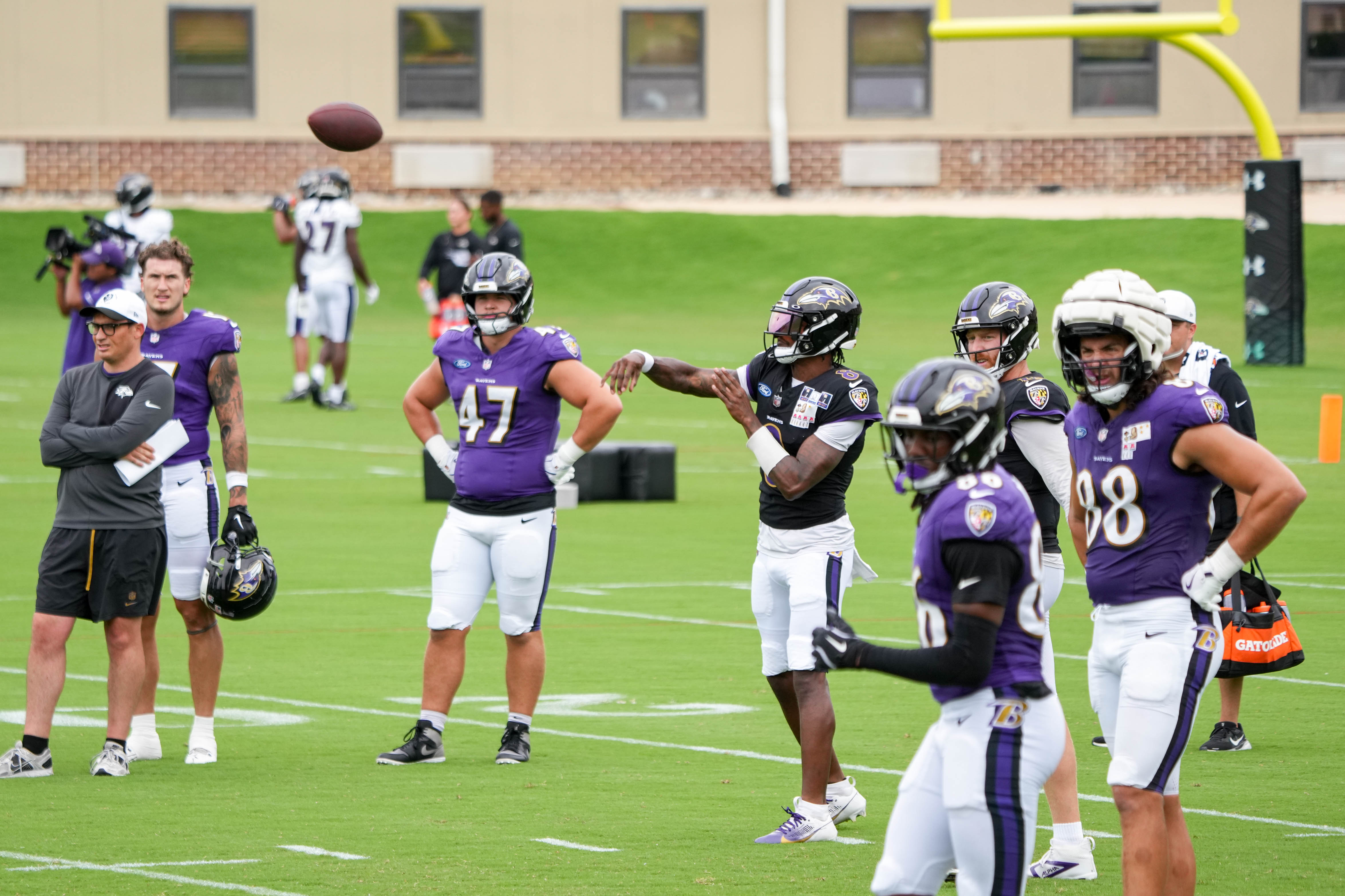 Baltimore Ravens quarterback Lamar Jackson (8) throws a pass during the team’s training camp at the Under Armour Performance Center in Owings Mills, Md. on Tuesday, August 19, 2025.