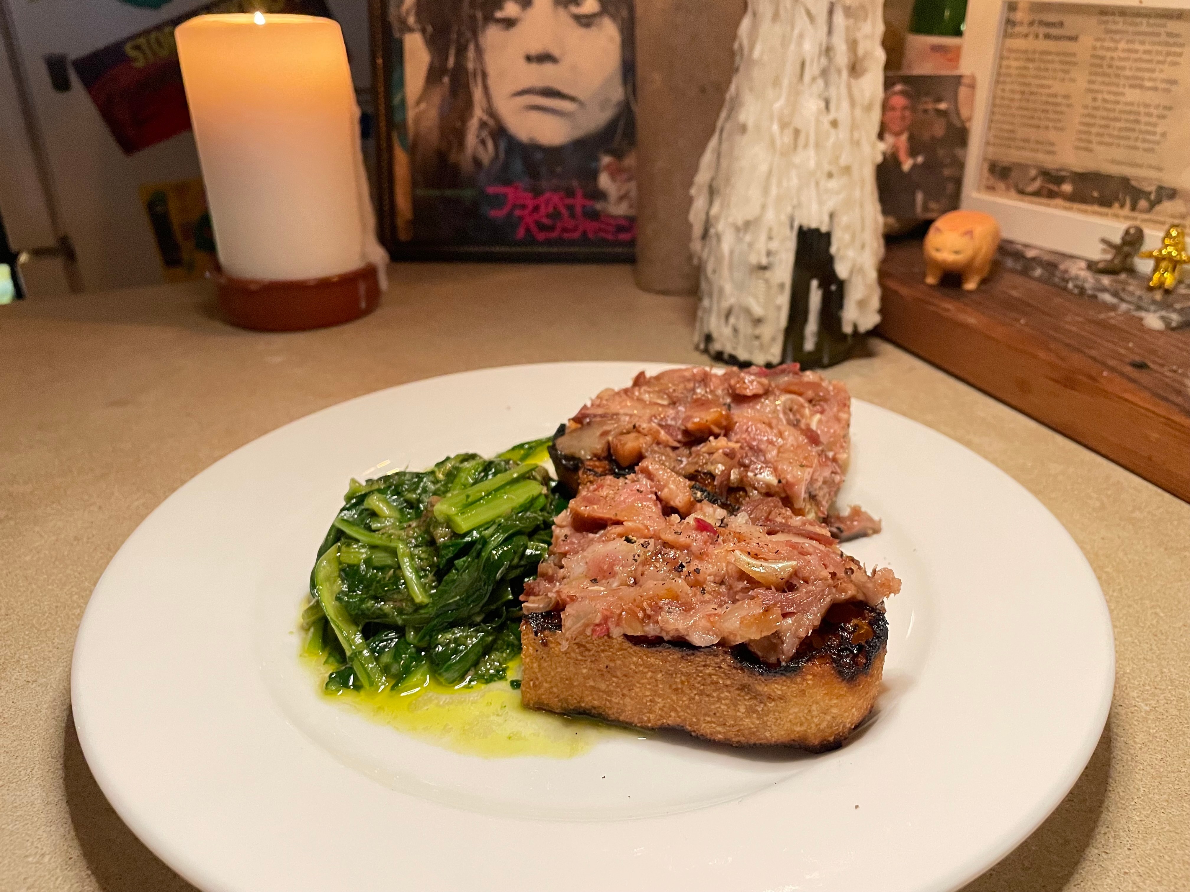 The pig head toast with dandelion greens at Le Comptoir du Vin. The Station North restaurant serves a menu designed to challenge, not pander.