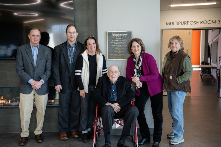 Edward Cochran, center, with some of his children and their spouses at the East Columbia 50+ Center after the building was dedication to him.