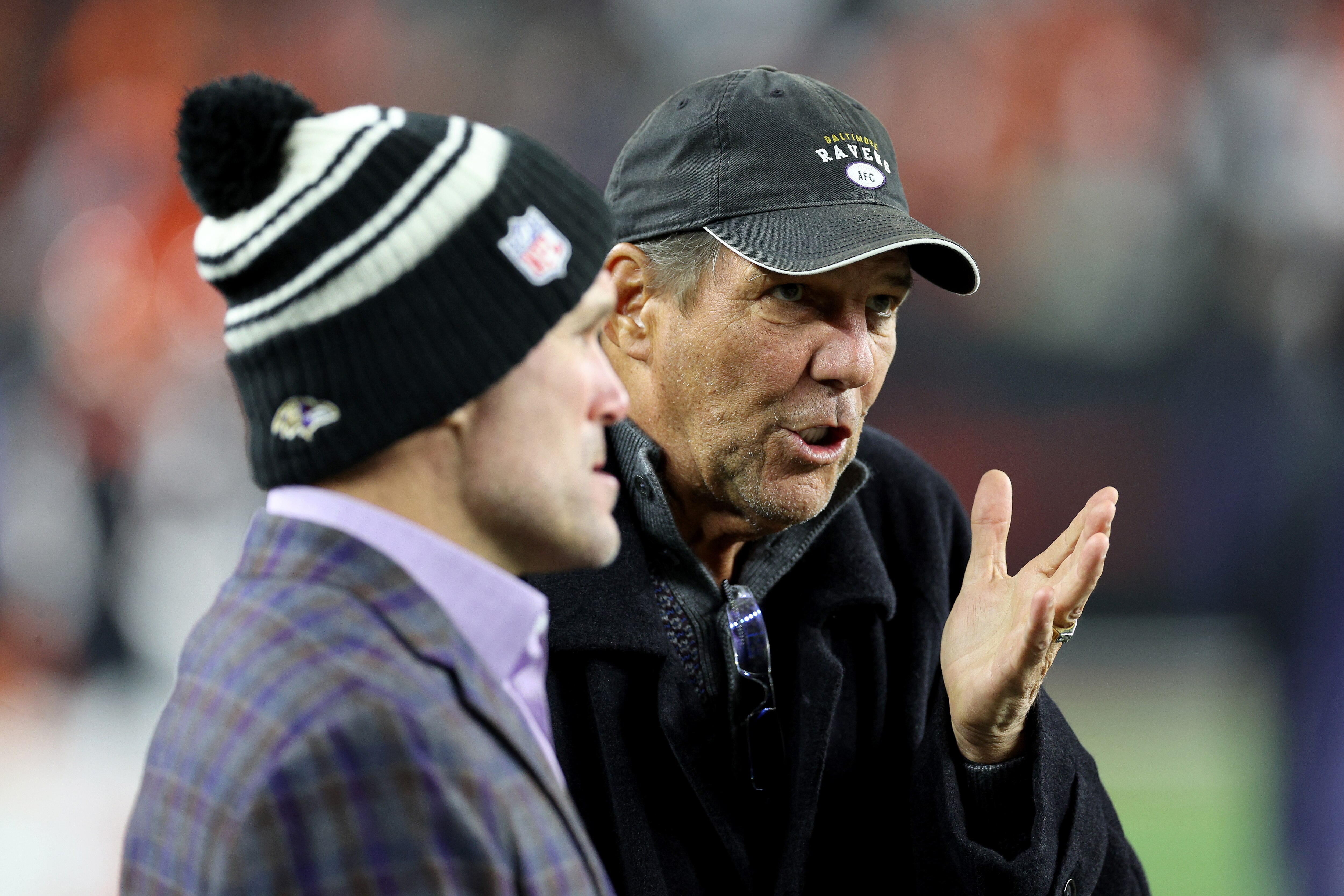 Baltimore Ravens Owner Steve Bisciotti, right, talks with General Manager Eric DeCosta prior to the AFC Wild Card playoff game against the Cincinnati Bengals at Paycor Stadium on January 15, 2023 in Cincinnati, Ohio. (Photo by Rob Carr/Getty Images)