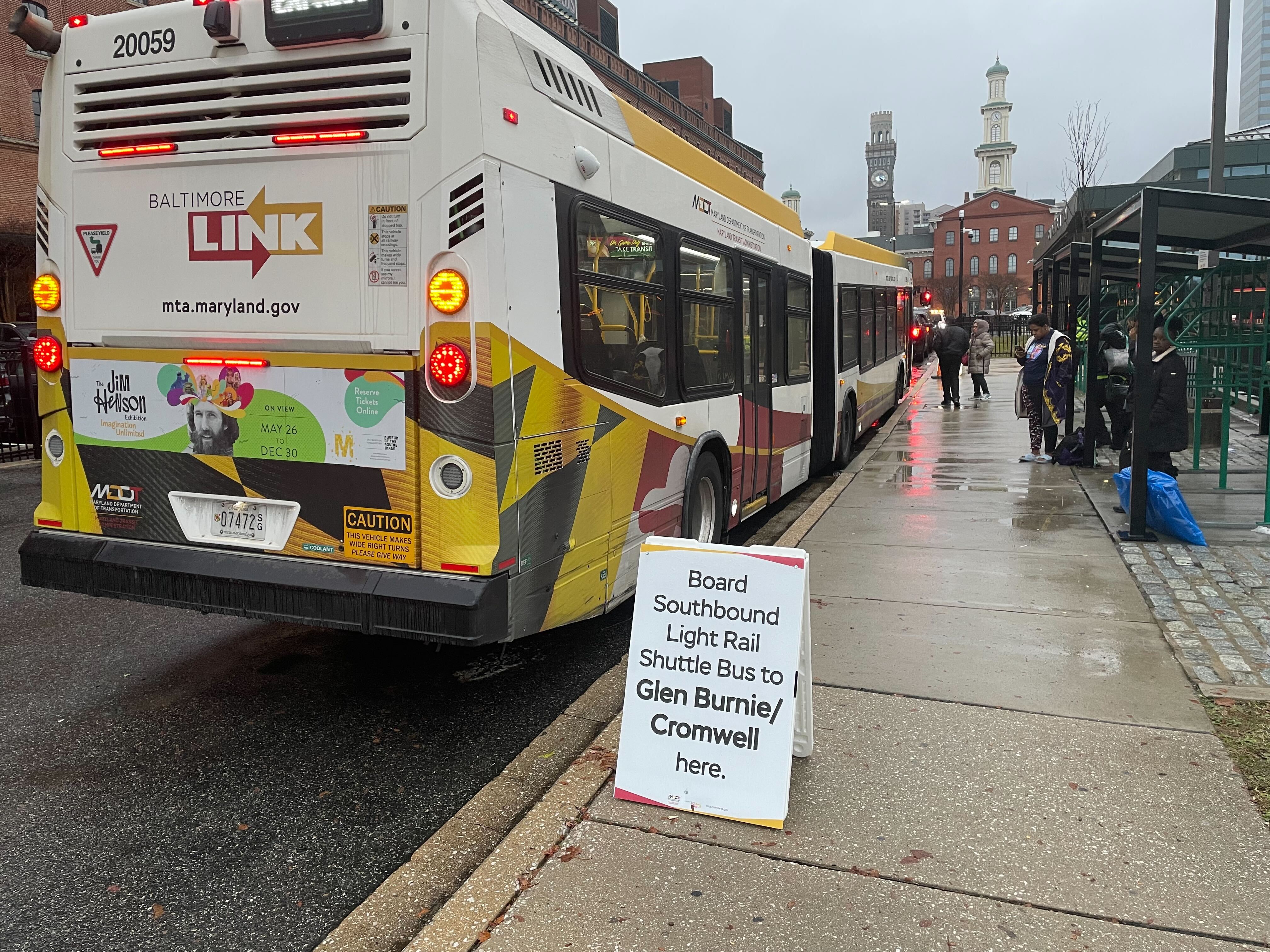 With the light rail out of service, MTA shuttle buses lined up at Camden Yards and extended dozens deep waiting for riders as early as the fourth quarter of the Ravens game against the Los Angeles Rams on Sunday afternoon. The shuttles departed as they filled up.