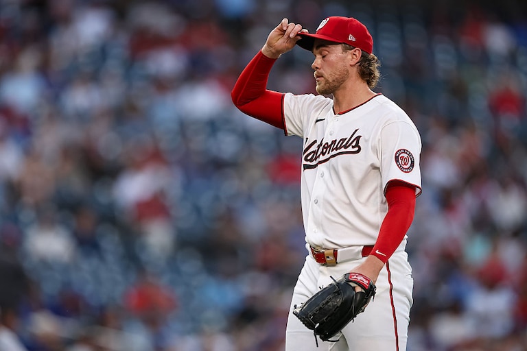 Washington Nationals right-hander Jake Irvin reacts after pitching against the Chicago Cubs during the second inning.