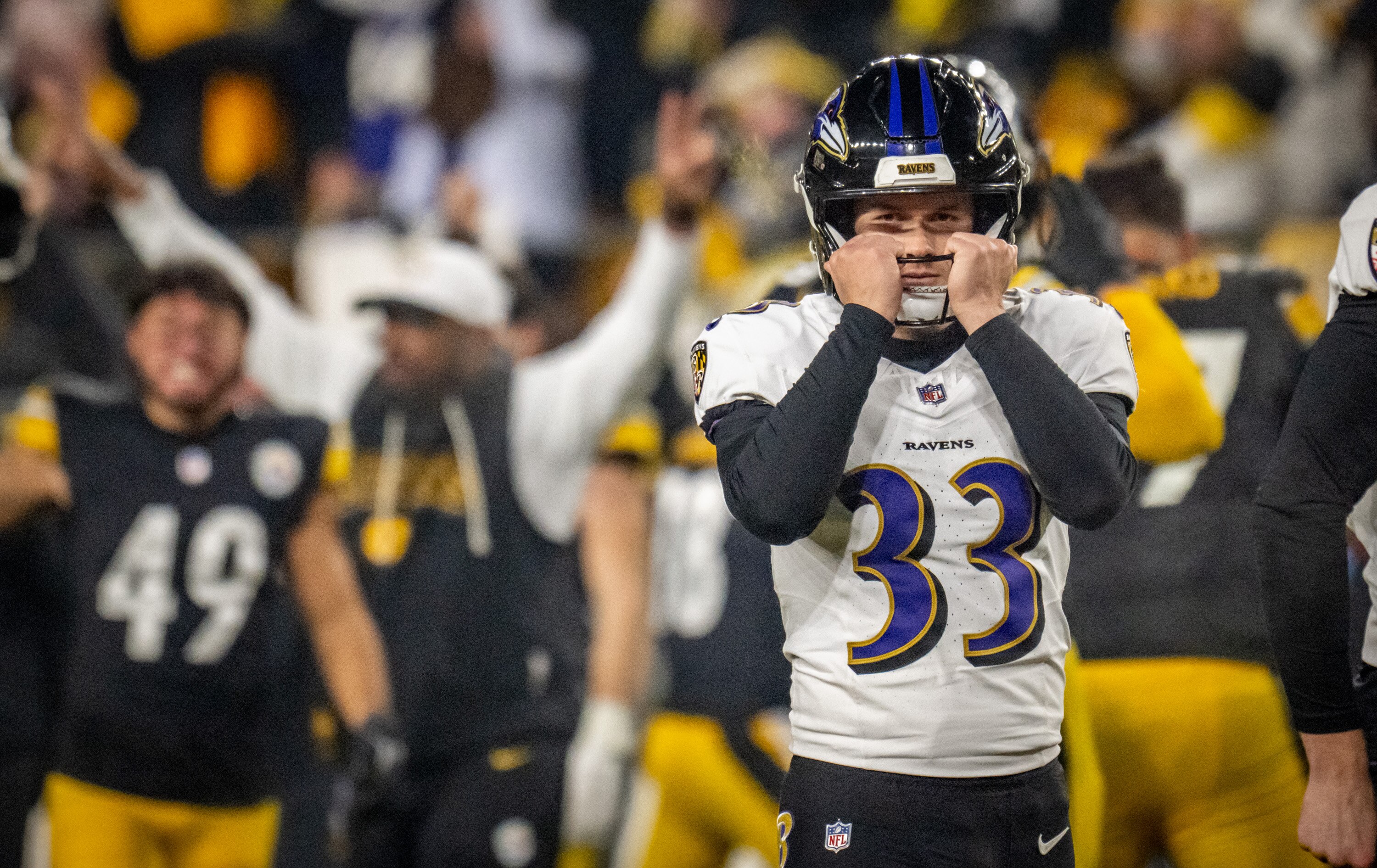 Ravens rookie kicker Tyler Loop reacts to missing what would have been the game-winning field goal against Pittsburgh. 