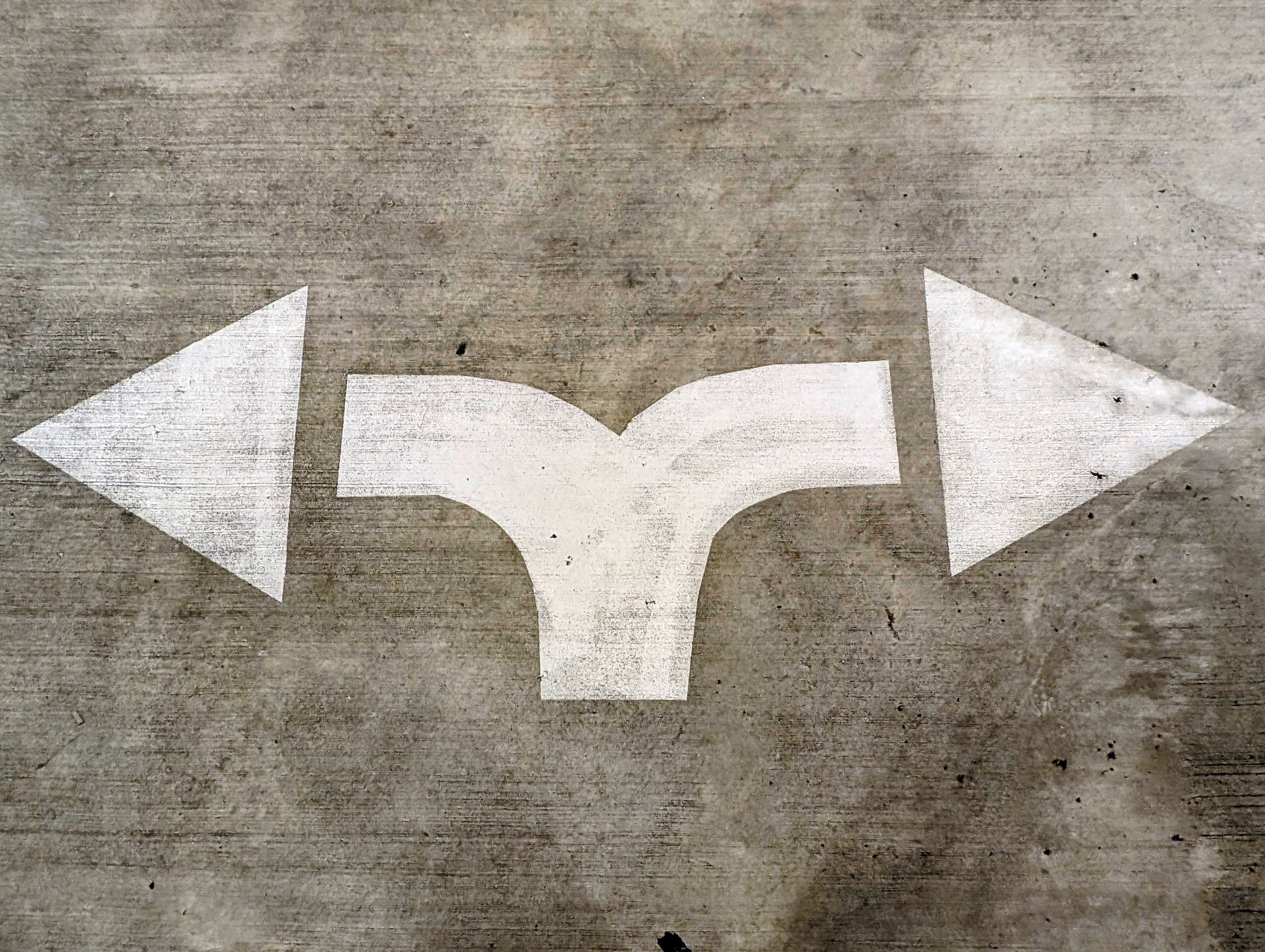 A directional arrow in the Mills-Hillman Garage in Annapolis shows the way to more spaces and an exit. If only it were that easy.