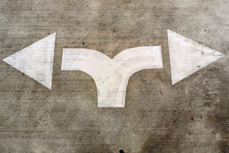 A directional arrow in the Mills-Hillman Garage in Annapolis shows the way to more spaces and an exit. If only it were that easy.