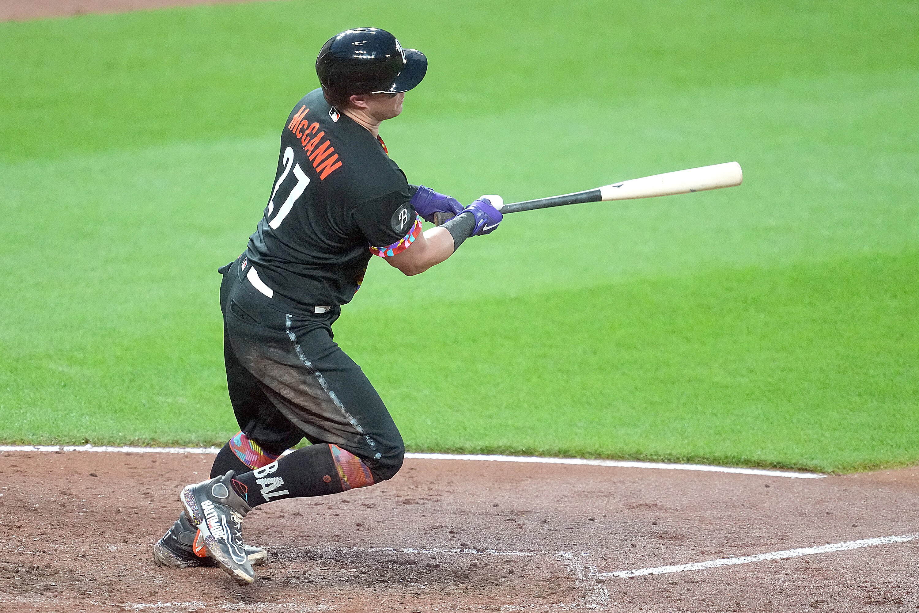 James McCann watches his single that brought home the first two runs of the game in the fourth inning Friday night at Camden Yards.