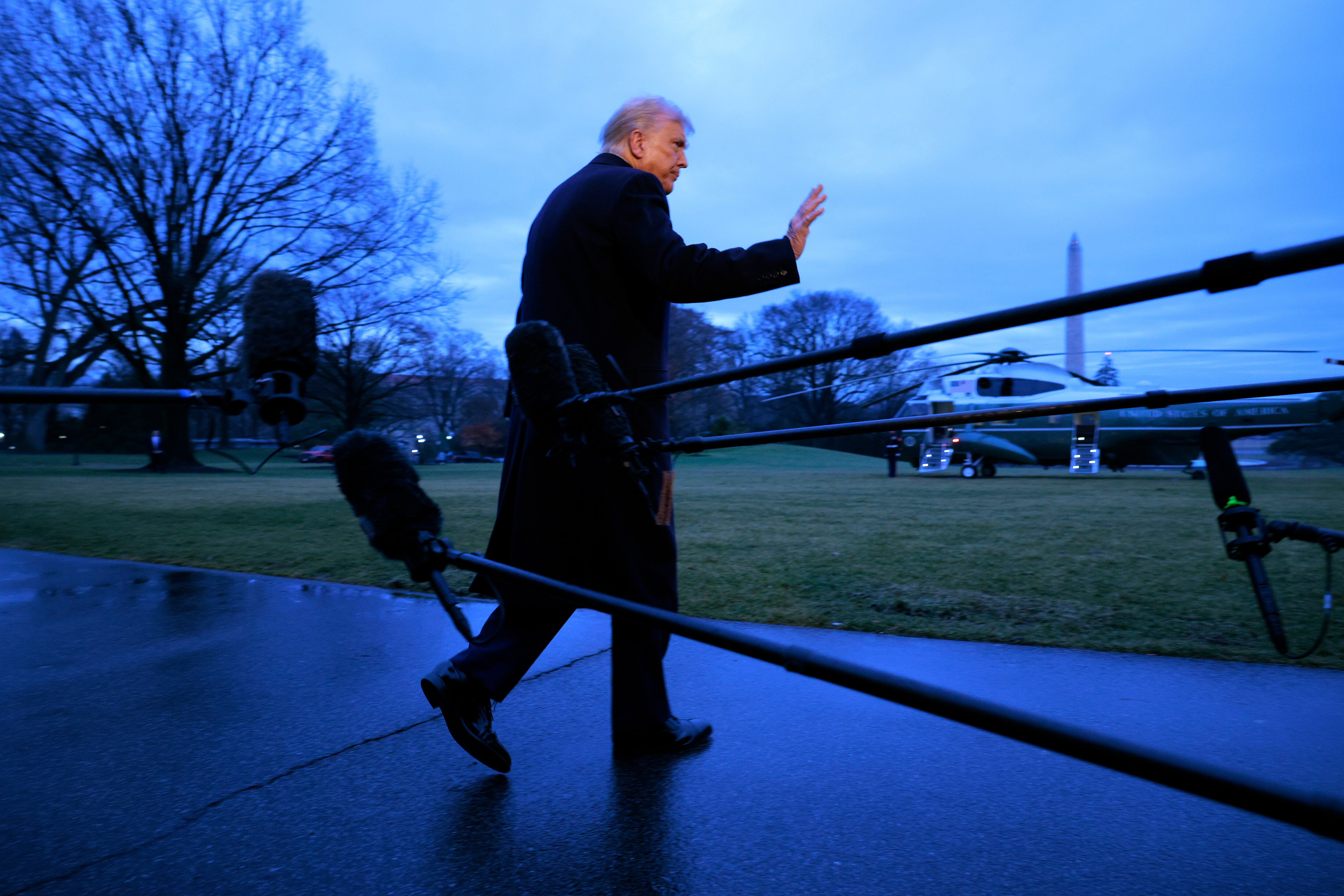 WASHINGTON, DC - JANUARY 31: U.S. President Donald Trump speaks briefly to the press as he departs the White House on January 31, 2025 in Washington, DC. Trump is traveling to his Mar-a-Lago Club in Palm Beach, Florida.