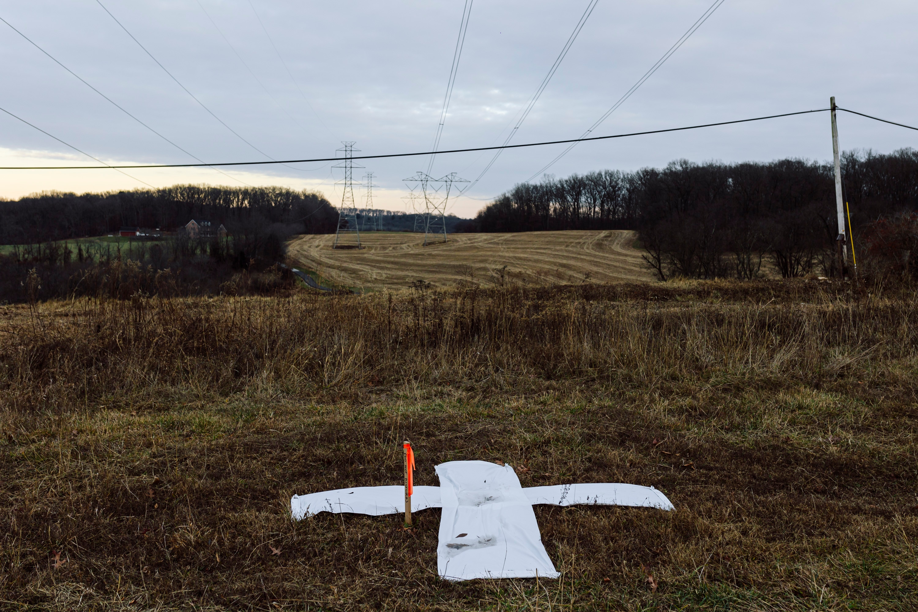 A white “x” marks the site of the new proposed transmission tower on Brandon and Marie Hill’s farmland in Parkton, MD on Friday, Dec. 13, 2024.