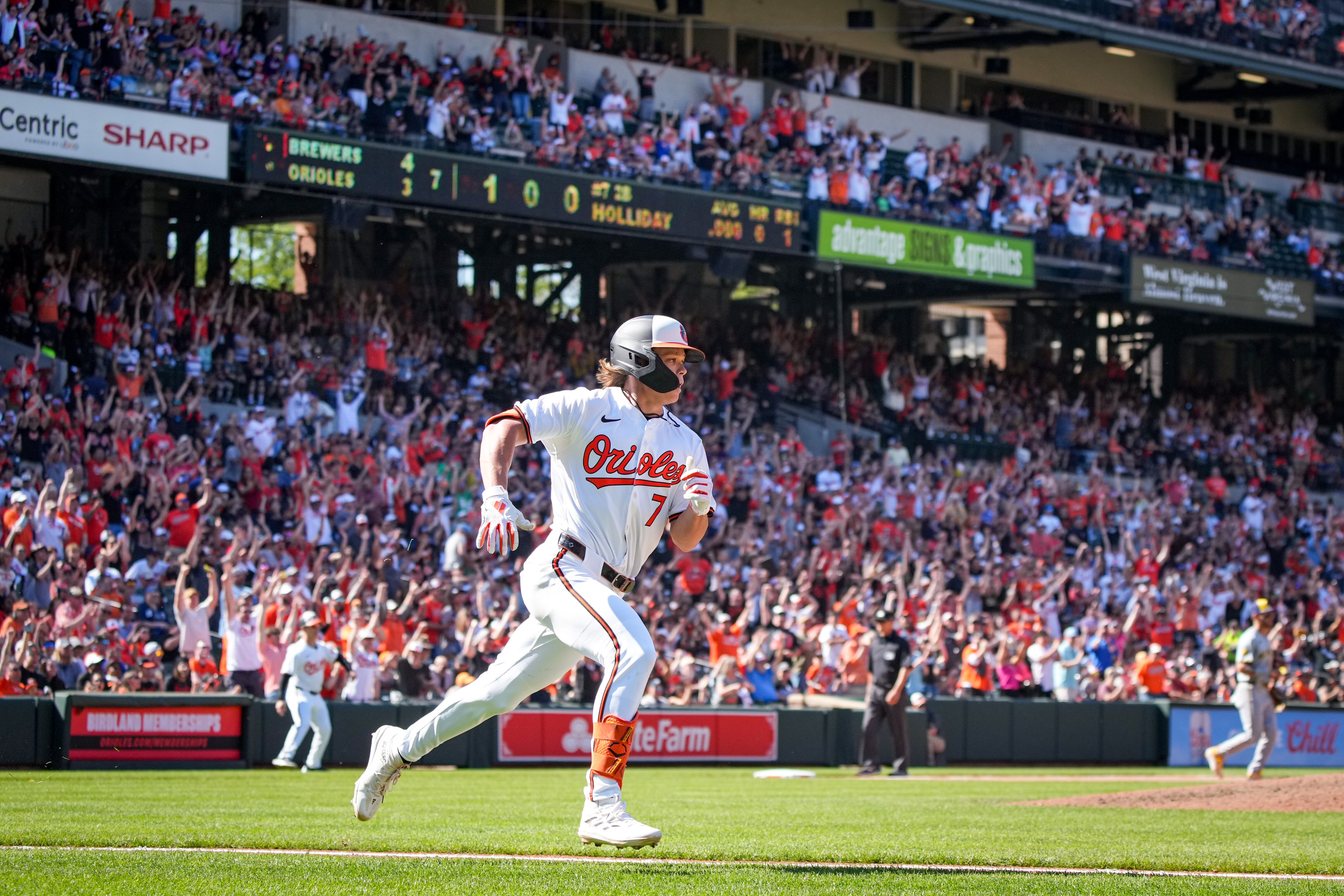Jackson Holliday approaches first base on his seventh-inning single Sunday against the Brewers. The Orioles beat the Brewers, 6-4, to avoid getting swept in the series.