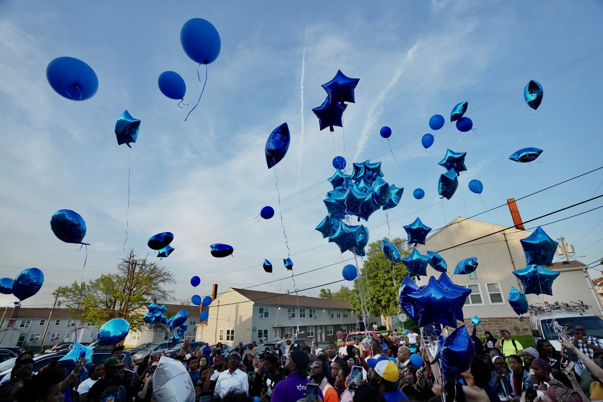 The South Baltimore community showed up for a candlelight vigil for Jaylen Richard, a 12-year-old fatally shot last Saturday, on April 20, 2023. (Kaitlin Newman / The Baltimore Banner)