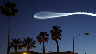 A SpaceX Falcon 9 rocket rises after launching from Vandenberg Space Force Base carrying 25 Starlink internet satellites on April 6, 2026 as seen from Pasadena, California.