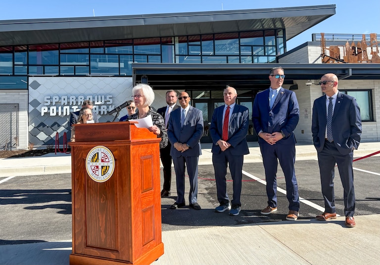 County Executive Kathy Klausmeier speaks at a ribbon cutting event for Sparrows Point Park on Wednesday, March 19, 2025. She is joined by Jessica Klaitman from Sen. Chris Van Hollen's office; Aaron Tomarchio of tradePoint Atlantic; Councilmen Pat Young, Julian Jones and Izzy Patoka; Rep. Johnny Olszewski; and Bob Smith, Director of the Department of Recreation and Parks.