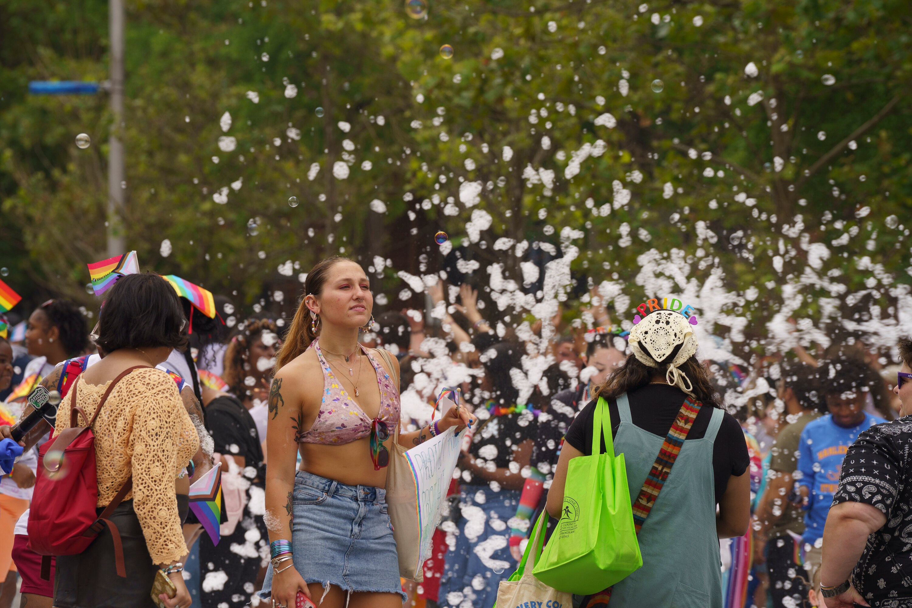A bubble machine sprays attendees at the 50th annual Baltimore Pride Parade in the Charles Village neighborhood of Baltimore on June 14, 2025.