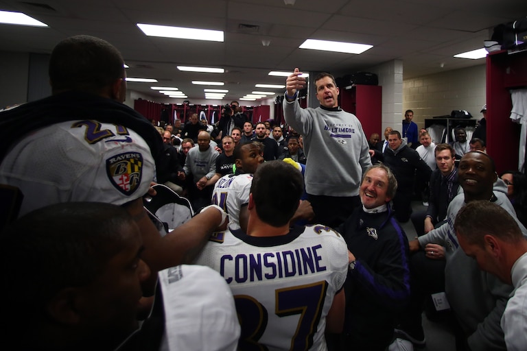 FOXBORO, MA - JANUARY 20: Head coach John Harbaugh of the Baltimore Ravens speaks to his team in the locker room after defeating the New England Patriots in the 2013 AFC Championship game at Gillette Stadium on January 20, 2013 in Foxboro, Massachusetts. The Baltimore Ravens defeated the New England Patriots 28-13.