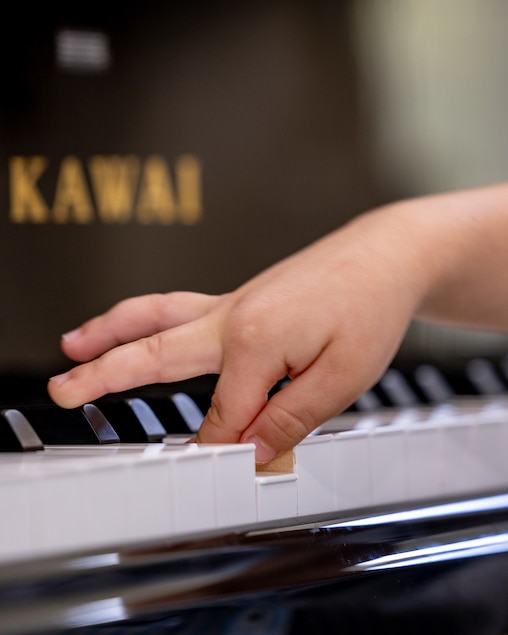 Michael Girgis, 4, plays the piano in his home. Girgis, who began learning the piano less than a year ago, is now set to make history as one of the youngest-ever performers at Carnegie Hall in New York City.
