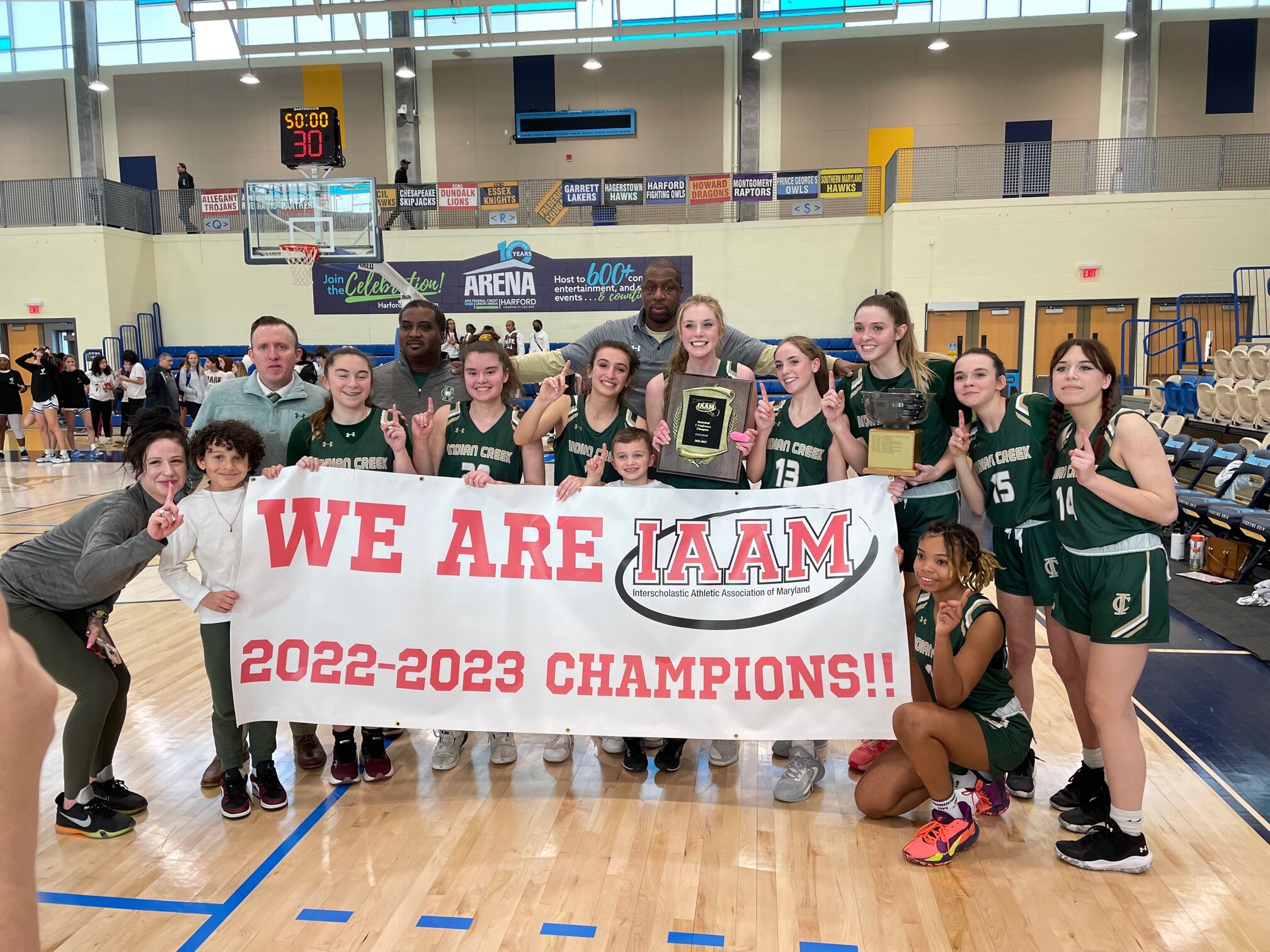 Indian Creek celebrates winning the IAAM C Conference basketball championship, 43-37, over Park Sunday at Harford Community College's APG Federal Credit Union Arena in Bel Air. Haley Semler (holding the bowl) led the Eagles with 22 points and 24 rebounds.