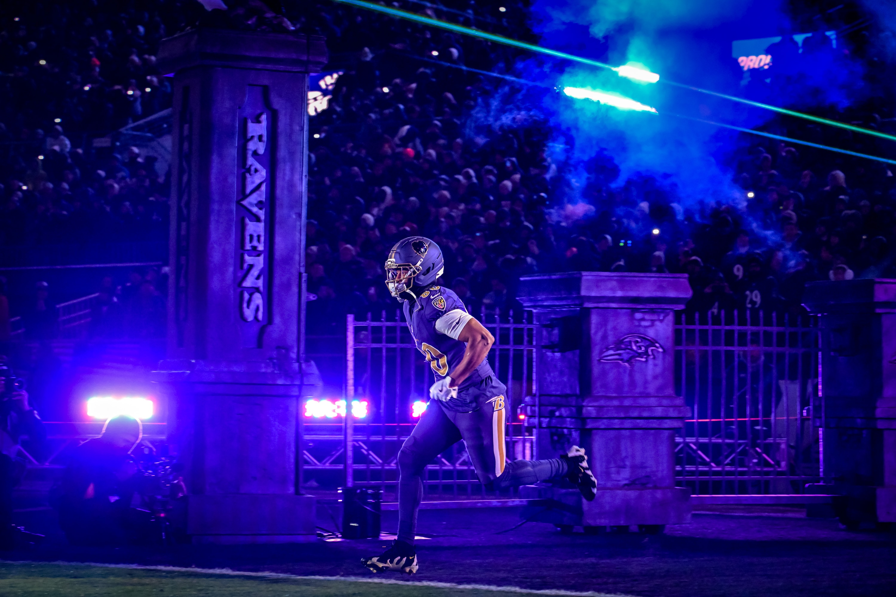 Ravens tight end Isaiah Likely takes the field during introductions before the team hosts the Bengals on Thanksgiving night.