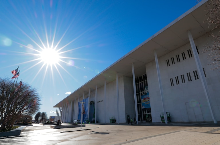 WASHINGTON, DC - DECEMBER 19: Workers adjust the name of the “John F. Kennedy Memorial Center for the Performing Arts" on December 19, 2025 in Washington, DC. The Kennedy Center Board of Trustees voted in what they say was a unanimous decision to rename the facility “The Donald J. Trump and The John F. Kennedy Memorial Center for the Performing Arts”.