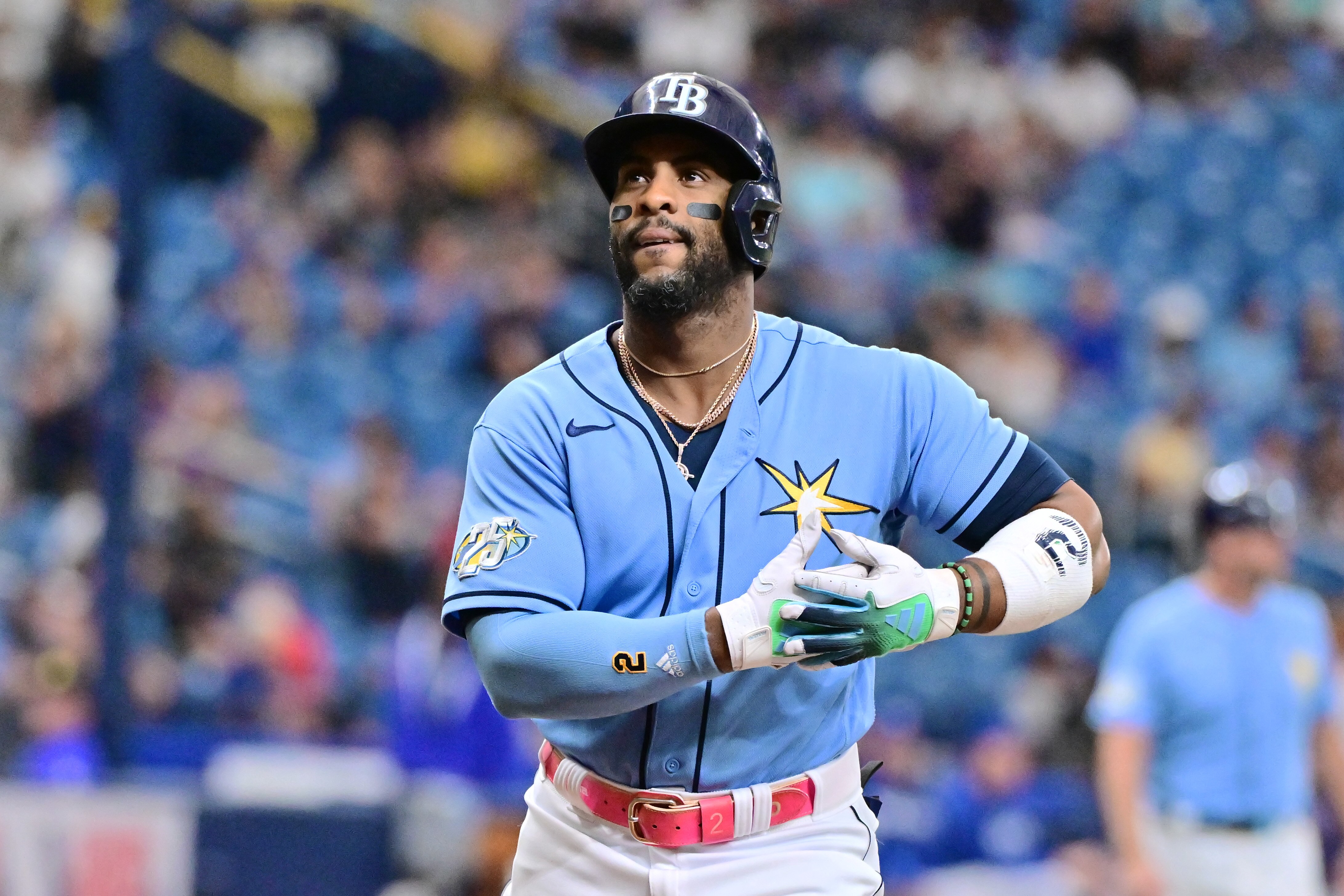 Yandy Diaz of the Rays crosses home plate after hitting a first-inning home run. (Photo by Julio Aguilar/Getty Images)