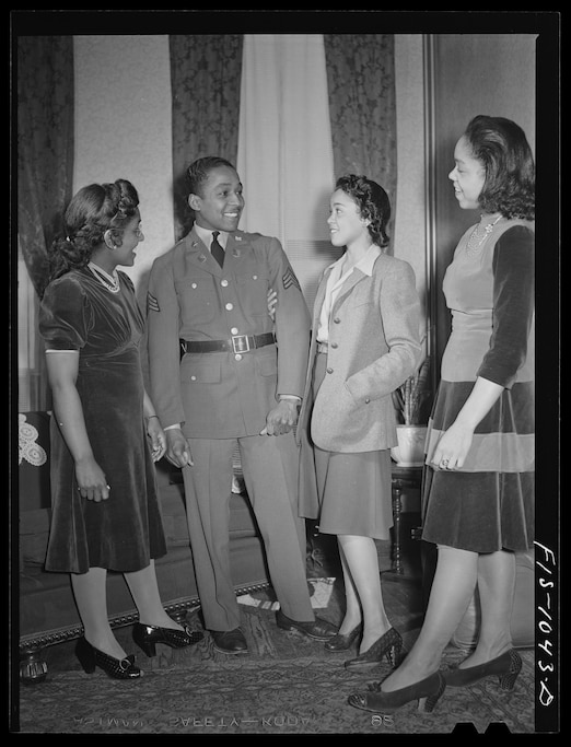 Baltimore, Maryland. Sargeant Franklin Williams, home on leave from Army duty, with his sister and his best girl Ellen