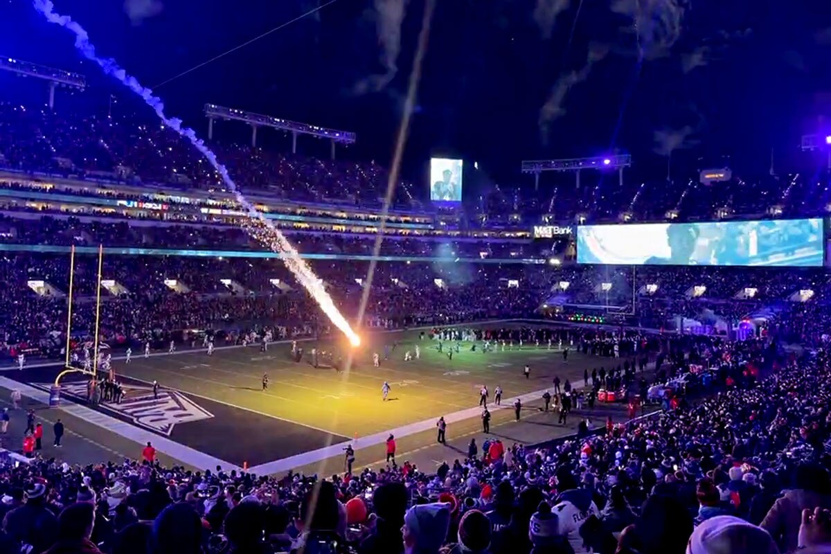 A photo taken by a fan shows a rogue firework landing on the field at M&T Bank Stadium during Sunday's pregame display; no one was hurt.