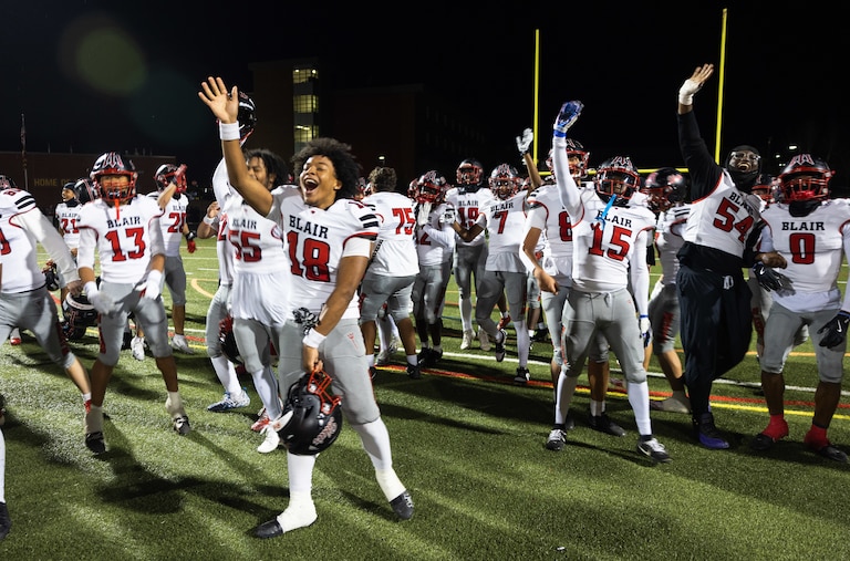 The Blair football team celebrates after beating Wheaton last week. They'll play Churchill in the quarterfinals on Friday, Nov. 21, 2025.