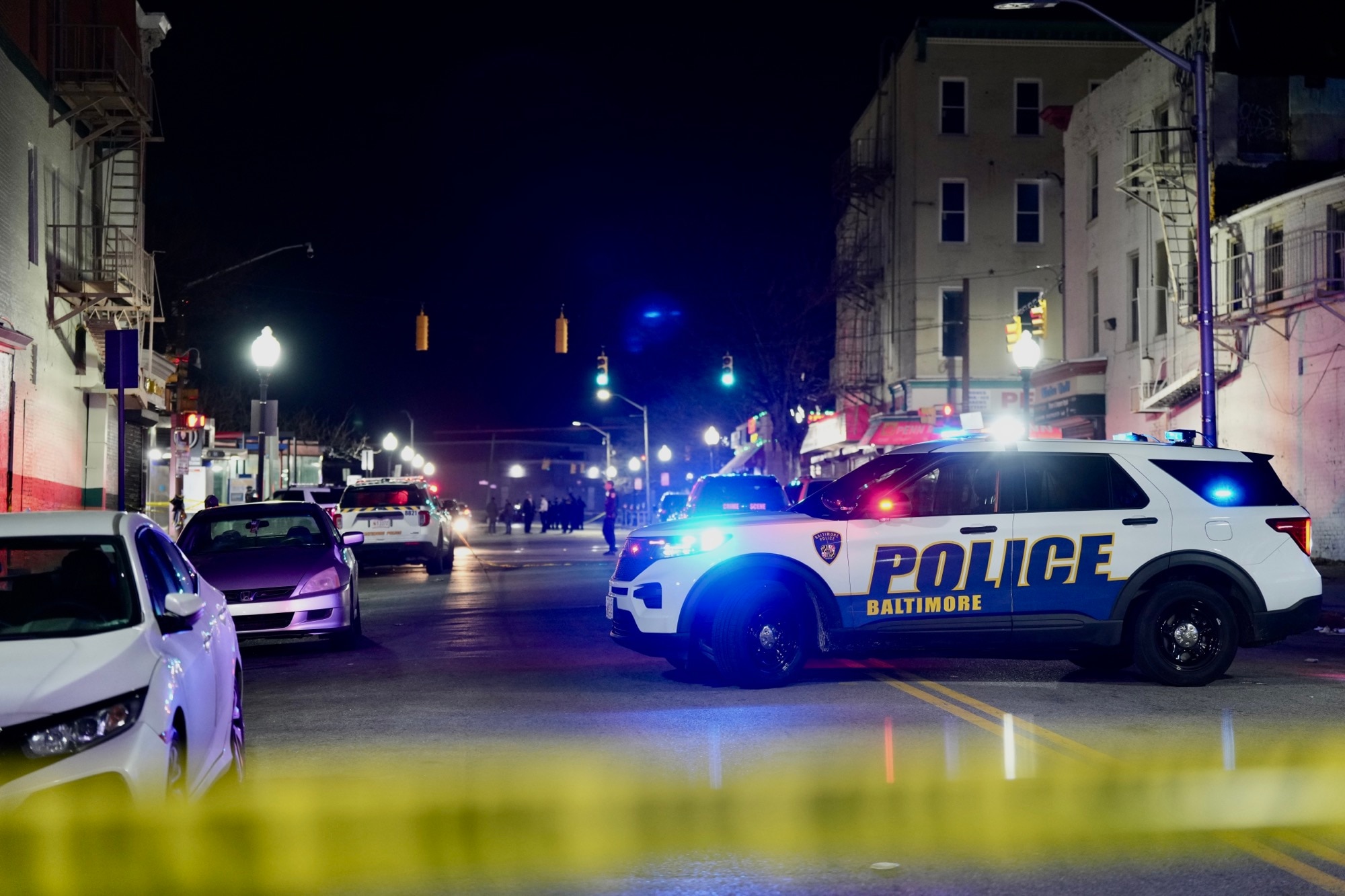 Mayor Brandon Scott, Councilman Eric Costello and Police Commissioner Michael Harrison hold a press conference after a mass shooting at the intersection of Pennsylvania Avenue and Laurens Street in Upton on January 28, 2023.