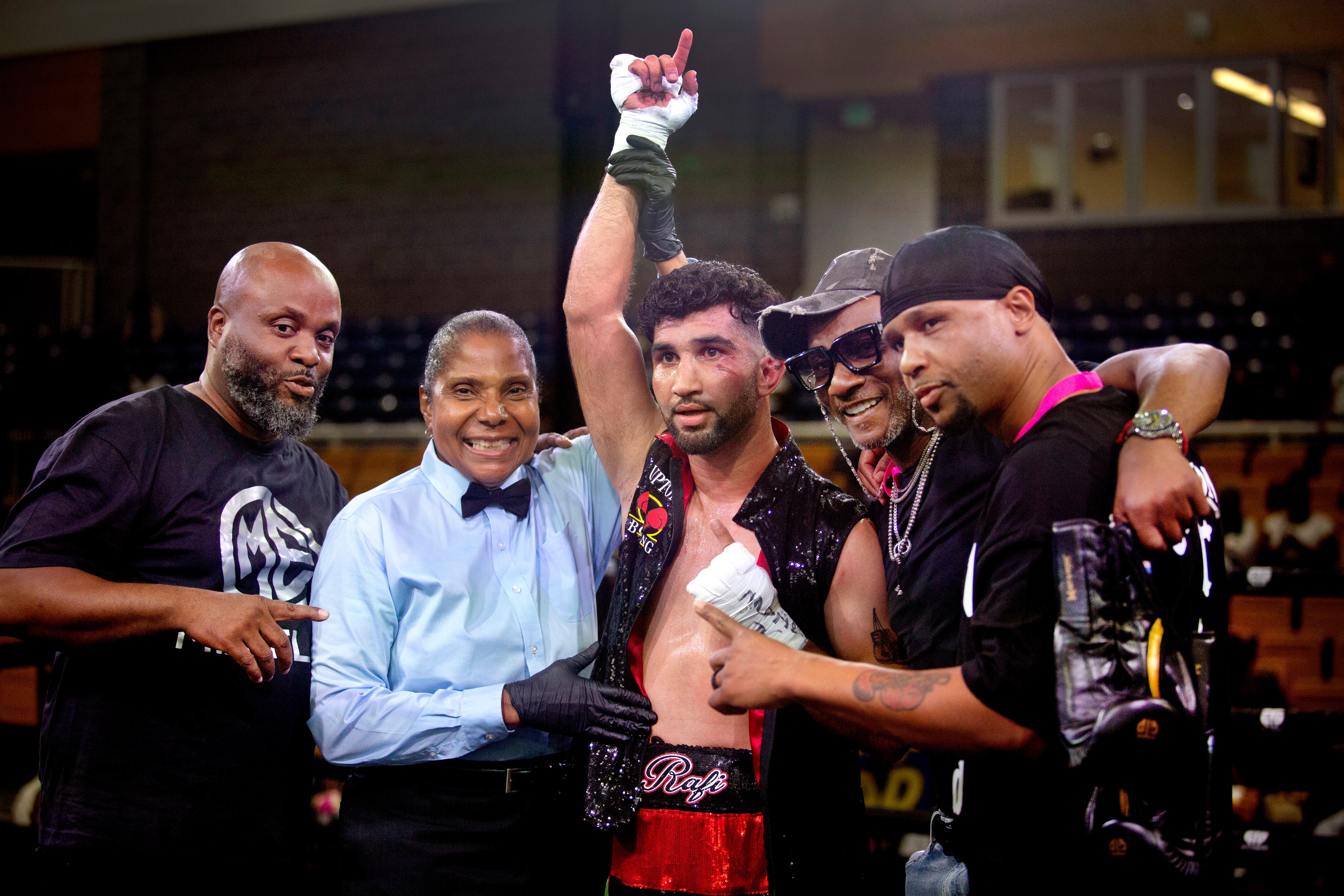 Coach Calvin Ford shed tears upon seeing Rafiullah Yari win in the second round. “You know, he told me the other day he felt like family. So you know I’m doing my job to make a person from another country feel that way.”