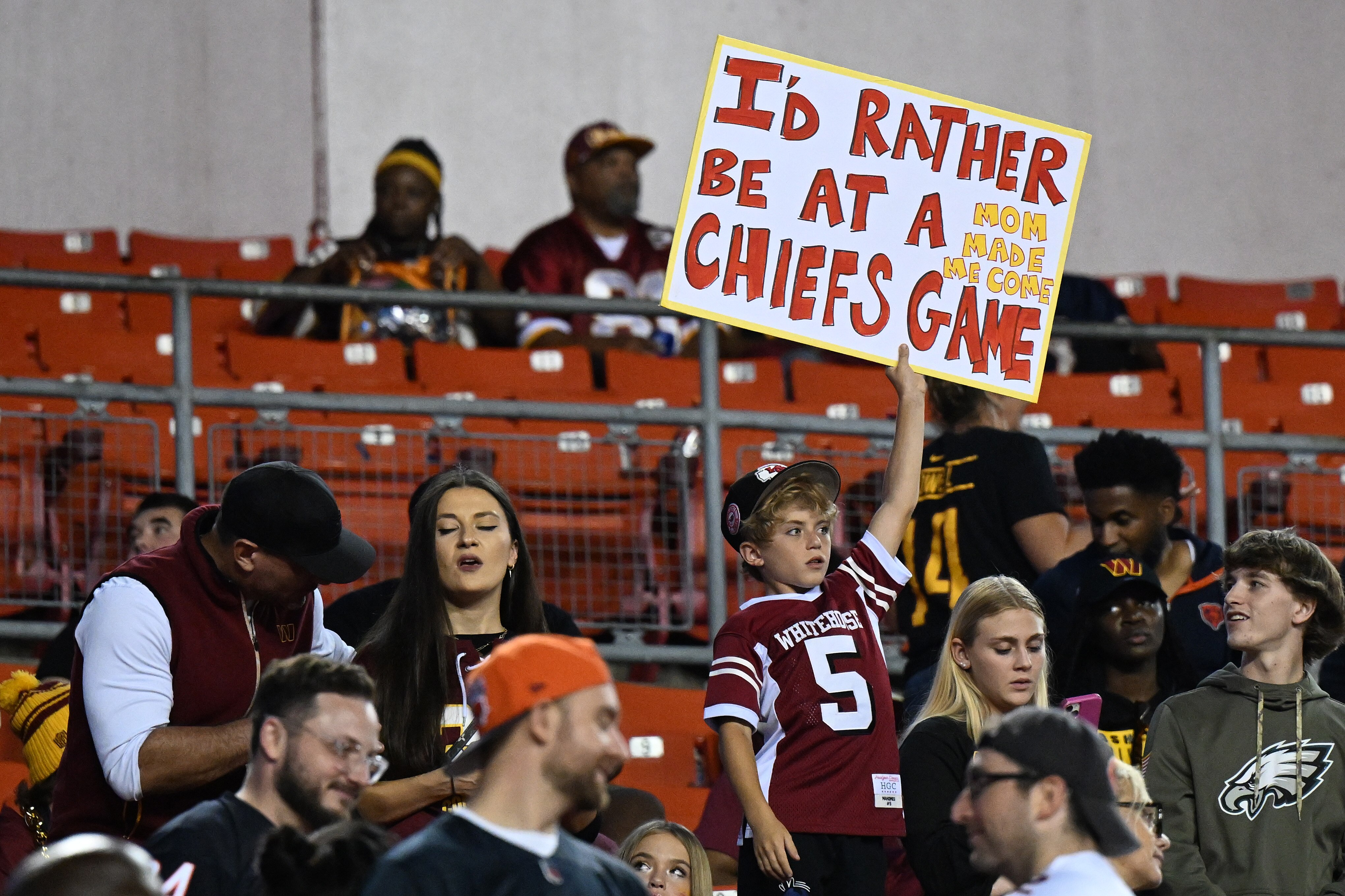 LANDOVER, MARYLAND - OCTOBER 05: A young fan holds a sign during the game between the Chicago Bears and the Washington Commanders at FedExField on October 05, 2023 in Landover, Maryland. (Photo by Greg Fiume/Getty Images)