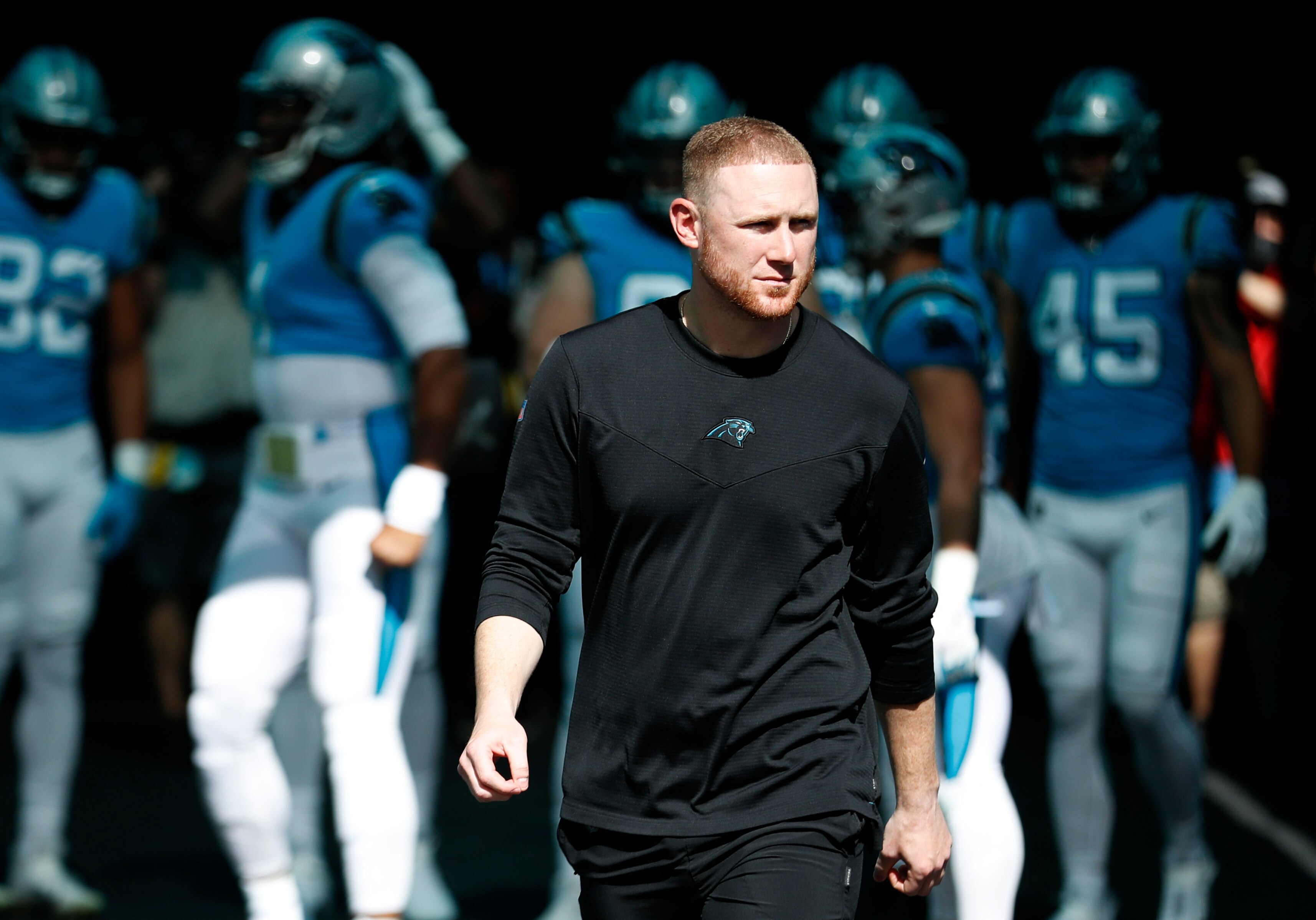 MIAMI GARDENS, FLORIDA - NOVEMBER 28: Offensive Coordinator Joe Brady Carolina Panthers takes the field before the game against the Miami Dolphins at Hard Rock Stadium on November 28, 2021 in Miami Gardens, Florida.