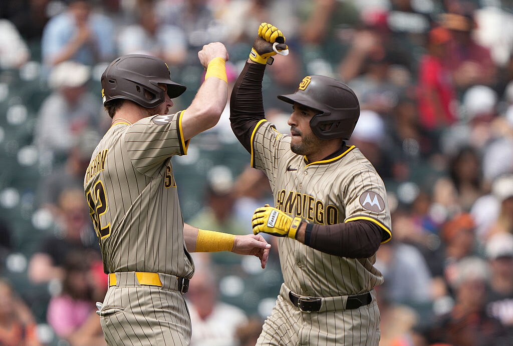 Ramón Laureano and Ryan O'Hearn of the San Diego Padres celebrates after Laureano hit a two-run home run against the San Francisco Giants on August 13.